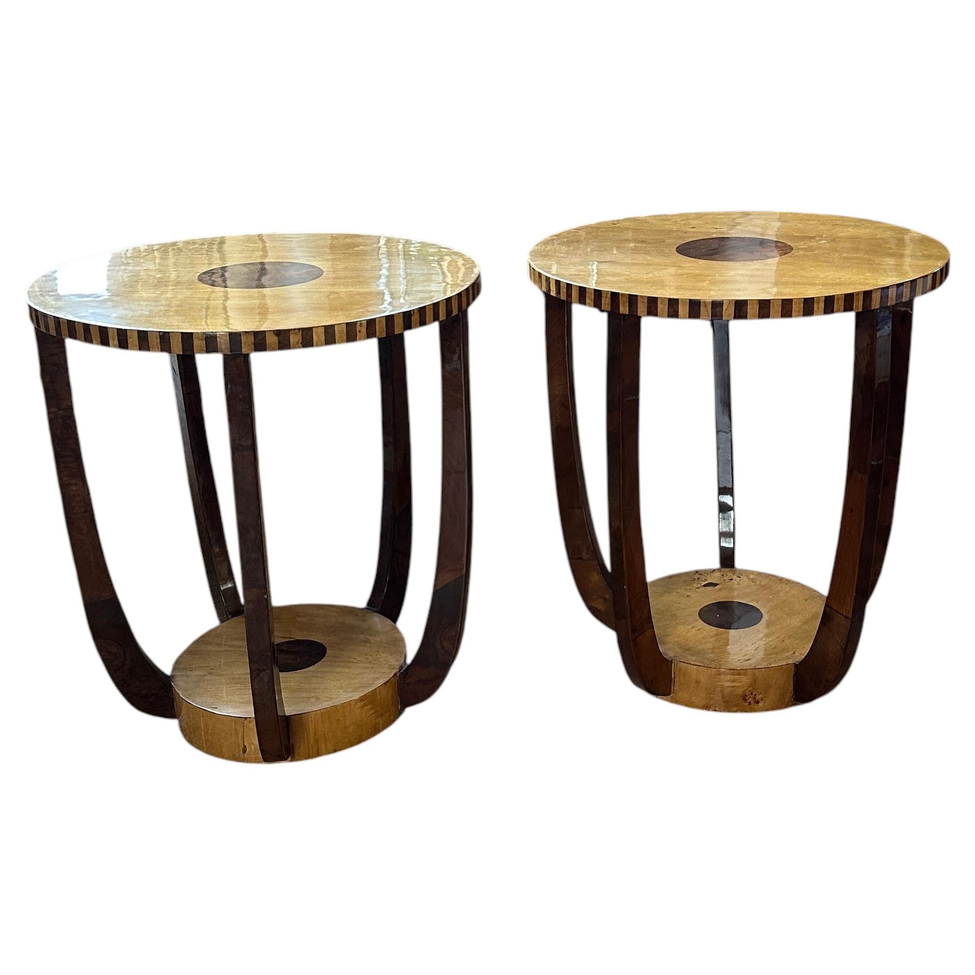 A pair of round two tiered side tables, 1970s Italian in the deco style