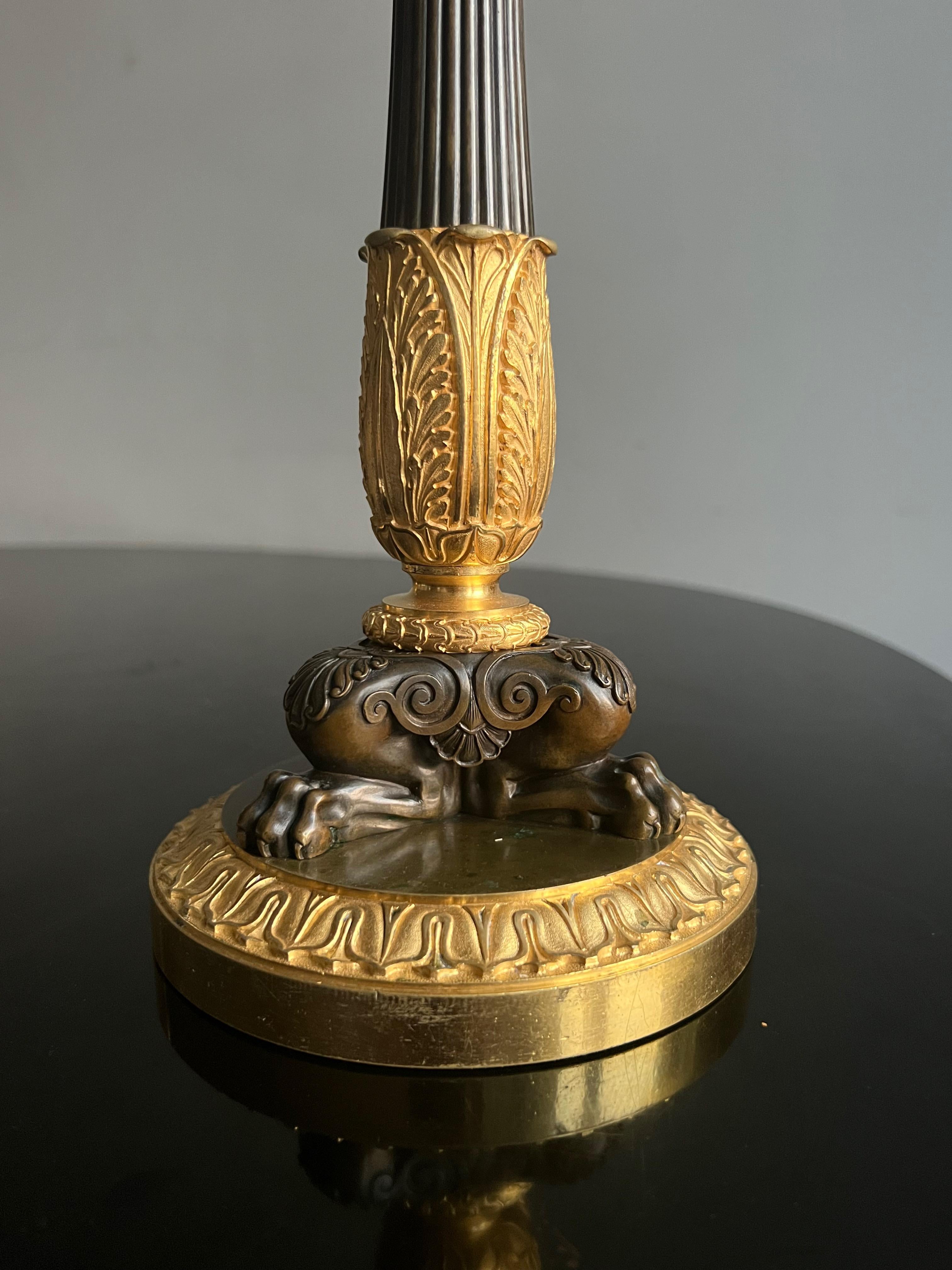 A fine pair of large candlesticks in finley chiselled, gilded and patinated bronze. The base has inventory marks attesting to their belonging to LOUIS-PHILIPPE I, Roi des Français (August 9, 1830 - February 24, 1848), for his residence Le Château de