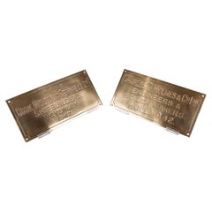 Vintage A pair of Royal Navy WWII shipbuilder's bronze plates from HMS Bern, dated 1942.