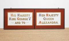 A Pair of Royal Warrant Proclamation Signs