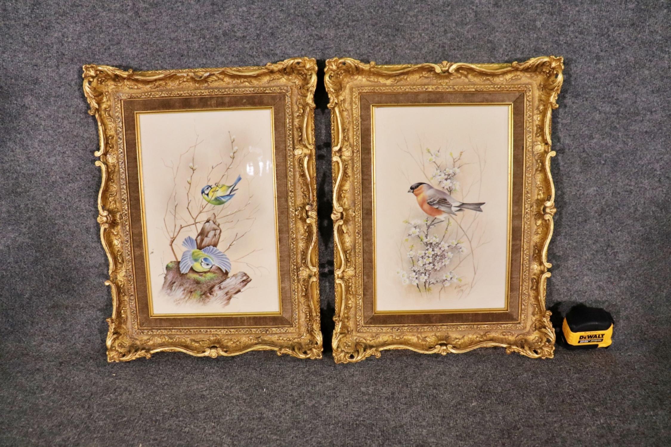 Signed E. Townsend and dated 1974. Number 14 (Bullfinch) and 15 (Blue - Tits) of 15. From a limited edition of 25 sets. British bird subjects by the Worcester Royal Porcelain Co. LTD. Hand carved frame commissioned by Royal Worcester. Measures 20