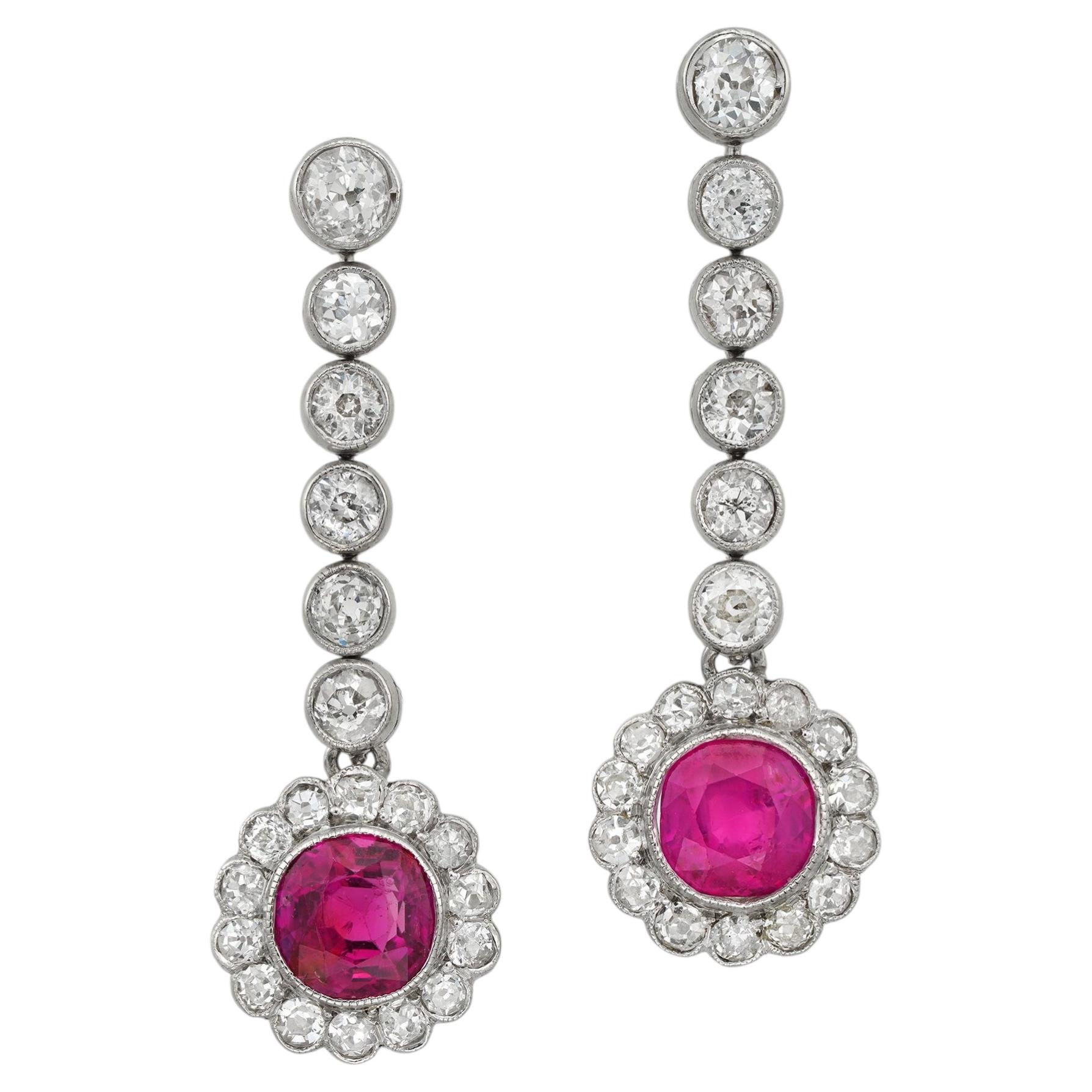 A pair of ruby and diamond drop earrings