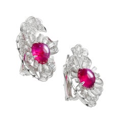 A pair of ruby and diamond earrings by David Web