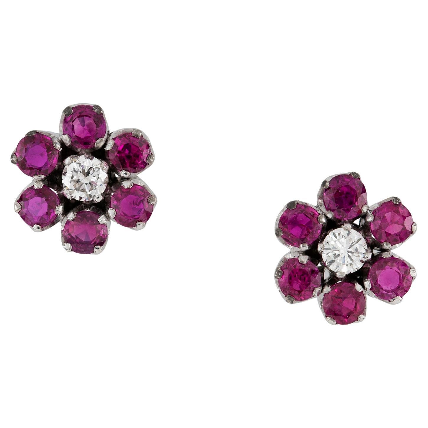 A Pair Of Ruby And Diamond Floral Cluster Stud Earrings