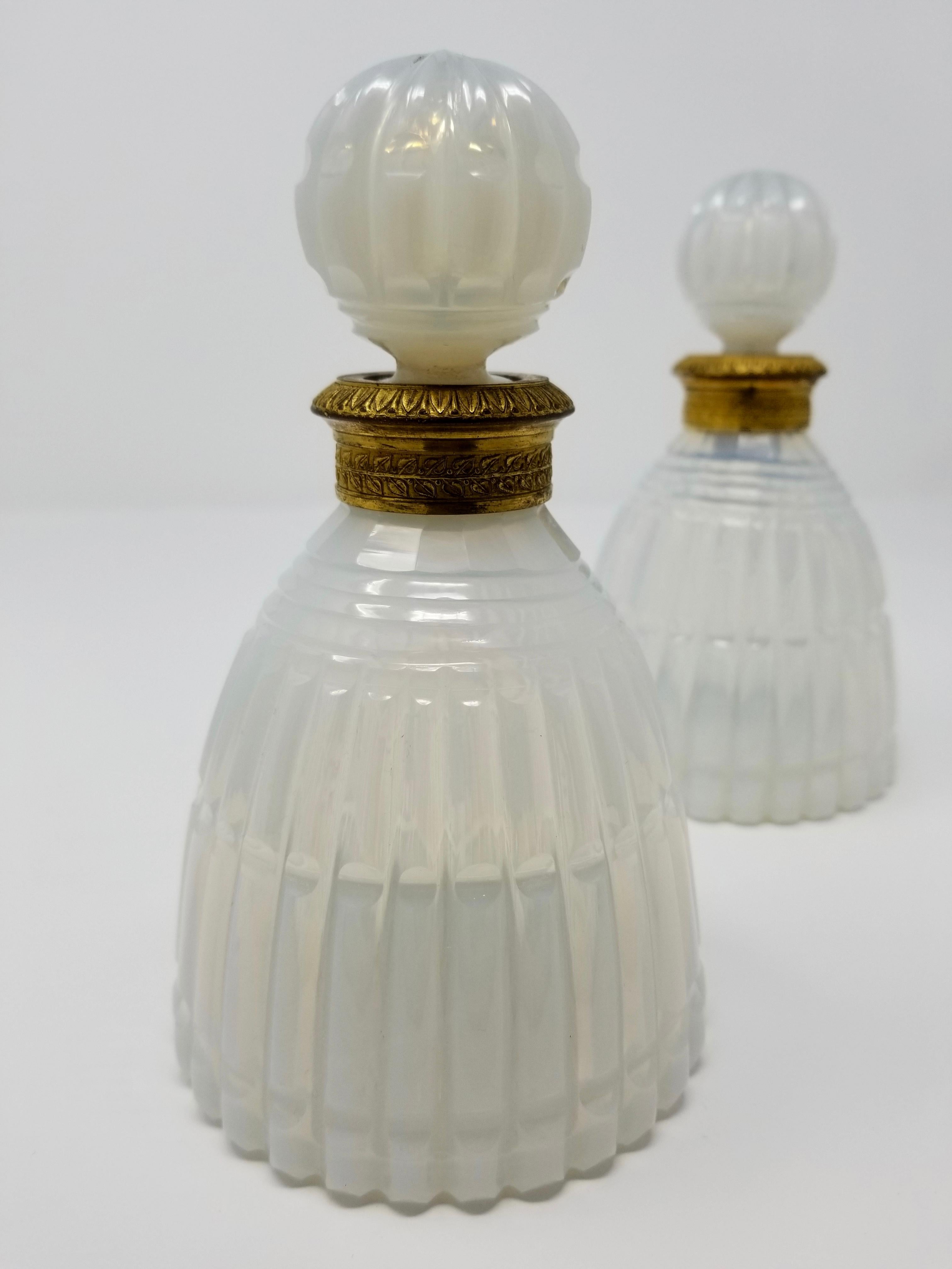 Louis XIV Pair of Russian Ormolu Mounted Fluted White Opaline Crystal Covered Bottles For Sale