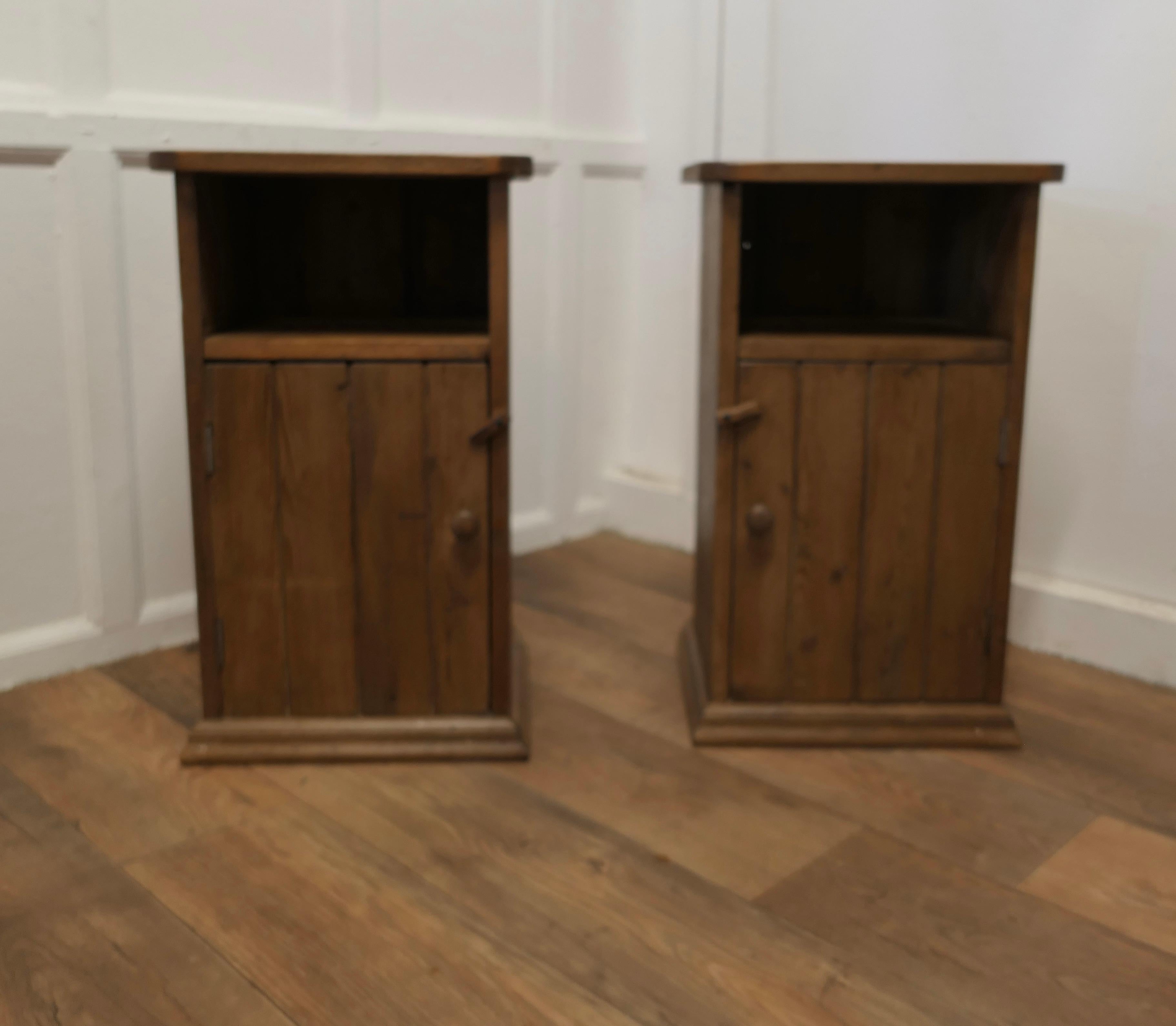 A Pair of Rustic Pine Bedside Cupboards, Night Tables

These attractive rustic pieces are made in pine, they have planked doors with a storage space over and they are shelved inside,  
The Night Tables are good and sturdy they are 27” tall, 16” wide