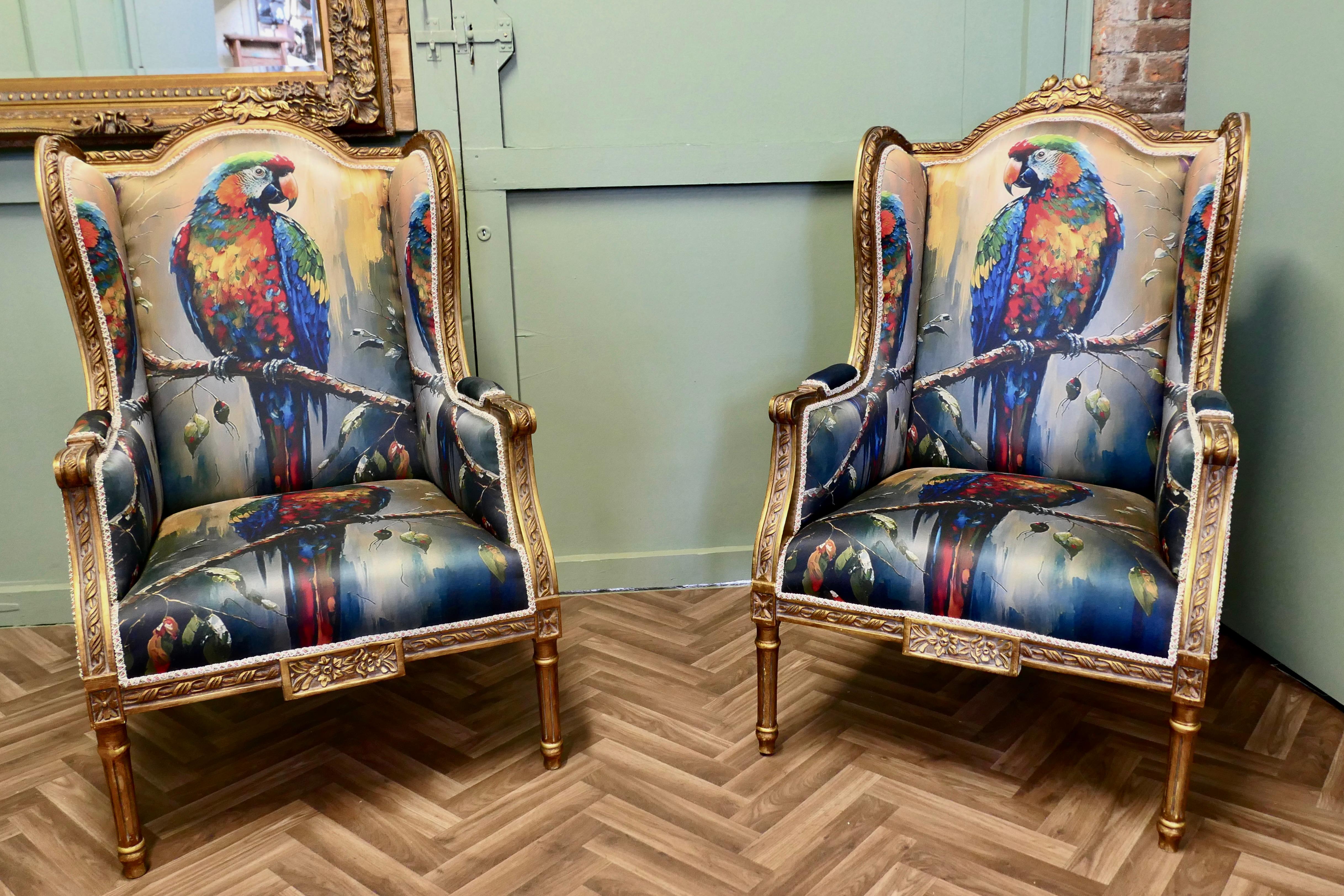 A Pair of Salon Chairs with Silk Parrot Design
 
A Pair of 19th Century French carved gilt wing arm salon chair
This is a splendid pair of French Provincial Chairs, the beautifully shaped back, has a detailed carved top rail, and the wings wrap