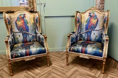 A Pair of Salon Chairs with Silk Parrot Design
