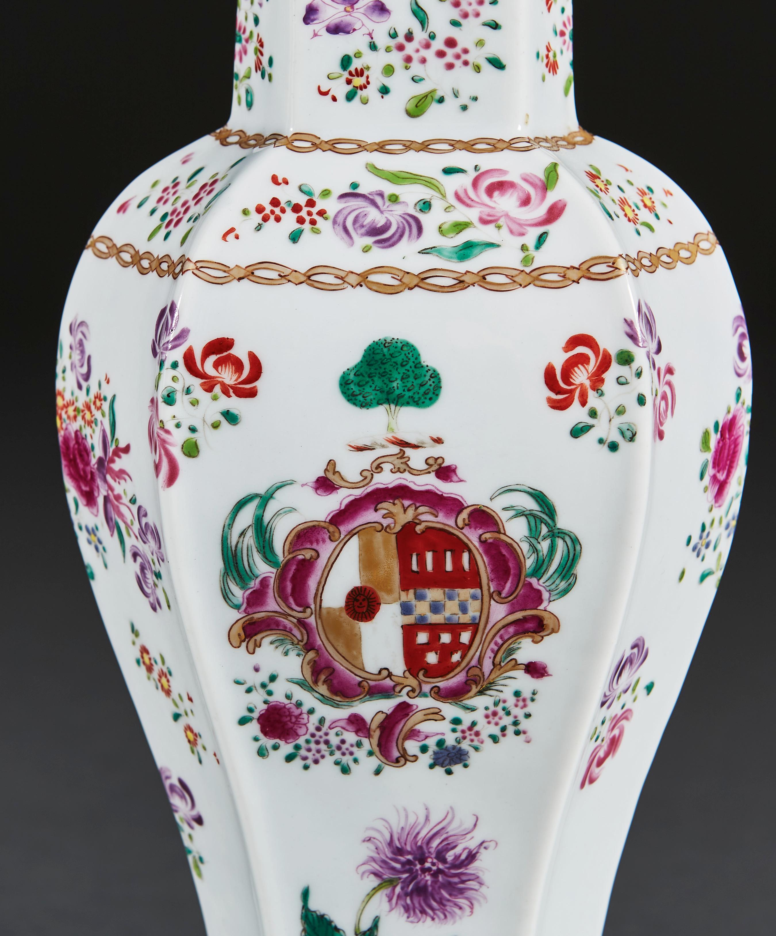 A pair of late 19th century Samson vases with pink, purple and red flowers surrounding an armorial crest, all on a white ground, now converted as lamps with hexagonal giltwood bases.

Please note: lampshades not included.

Currently wired for