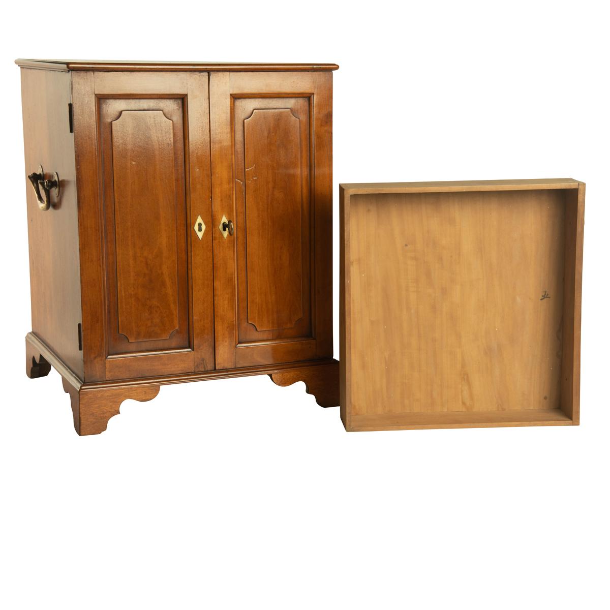 A pair of satinwood Anglo Chinese collector’s table cabinets, each of rectangular form with a pair of doors which open to reveal five long drawers with ivory keyhole surrounds, each drawer marked inside with a Chinese numeral, the sides with applied