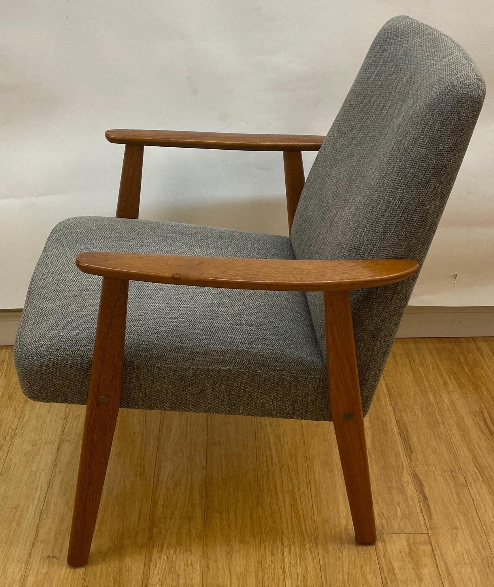 These sleek chairs are perfectly proportioned in the minimalist style of the mid century.  Lightweight, but made from teak- a strong tropical hardwood they are sprung and cushioned in both seat and back.
