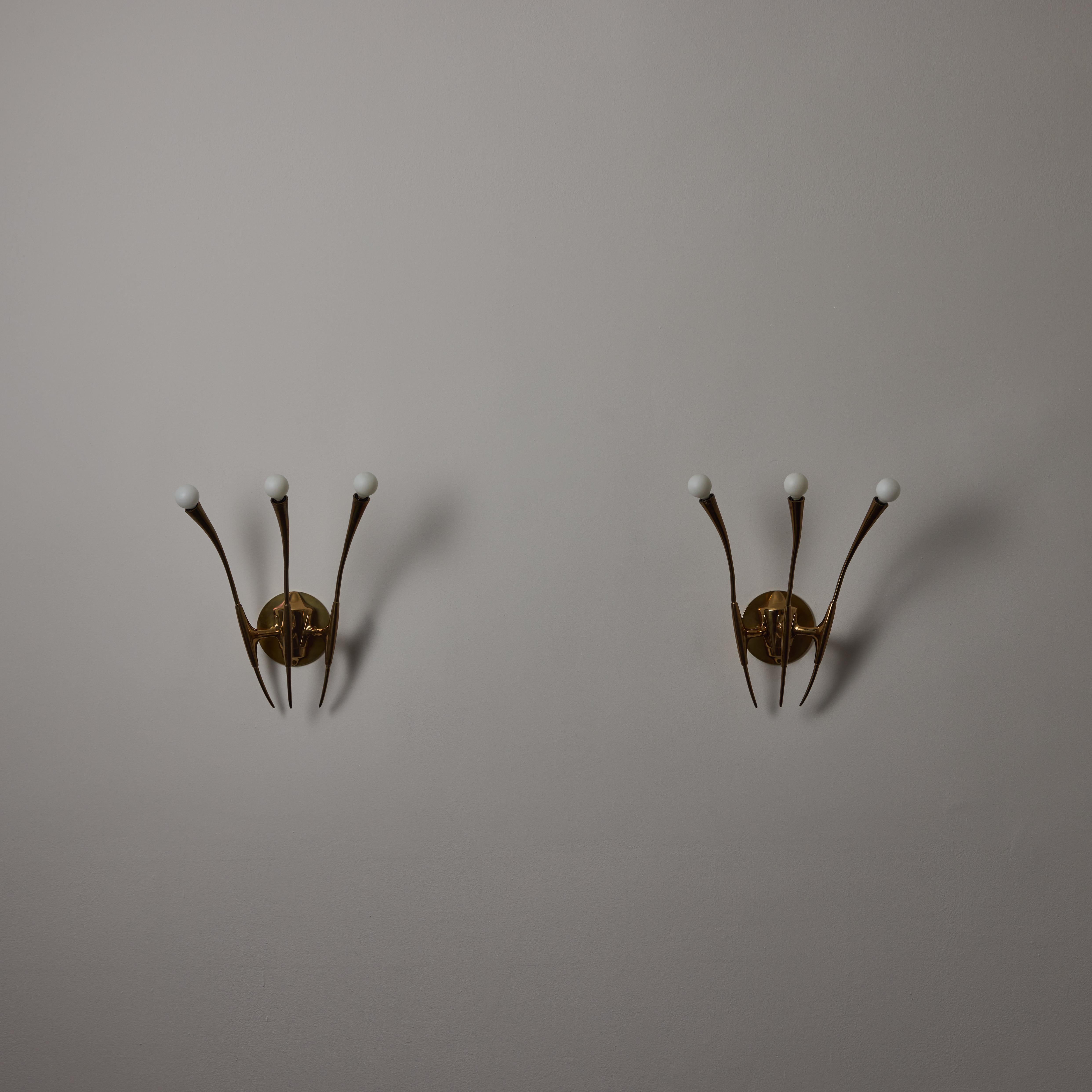 Mid-Century Modern A Pair of Sconces by Oscar Torlasco For Sale