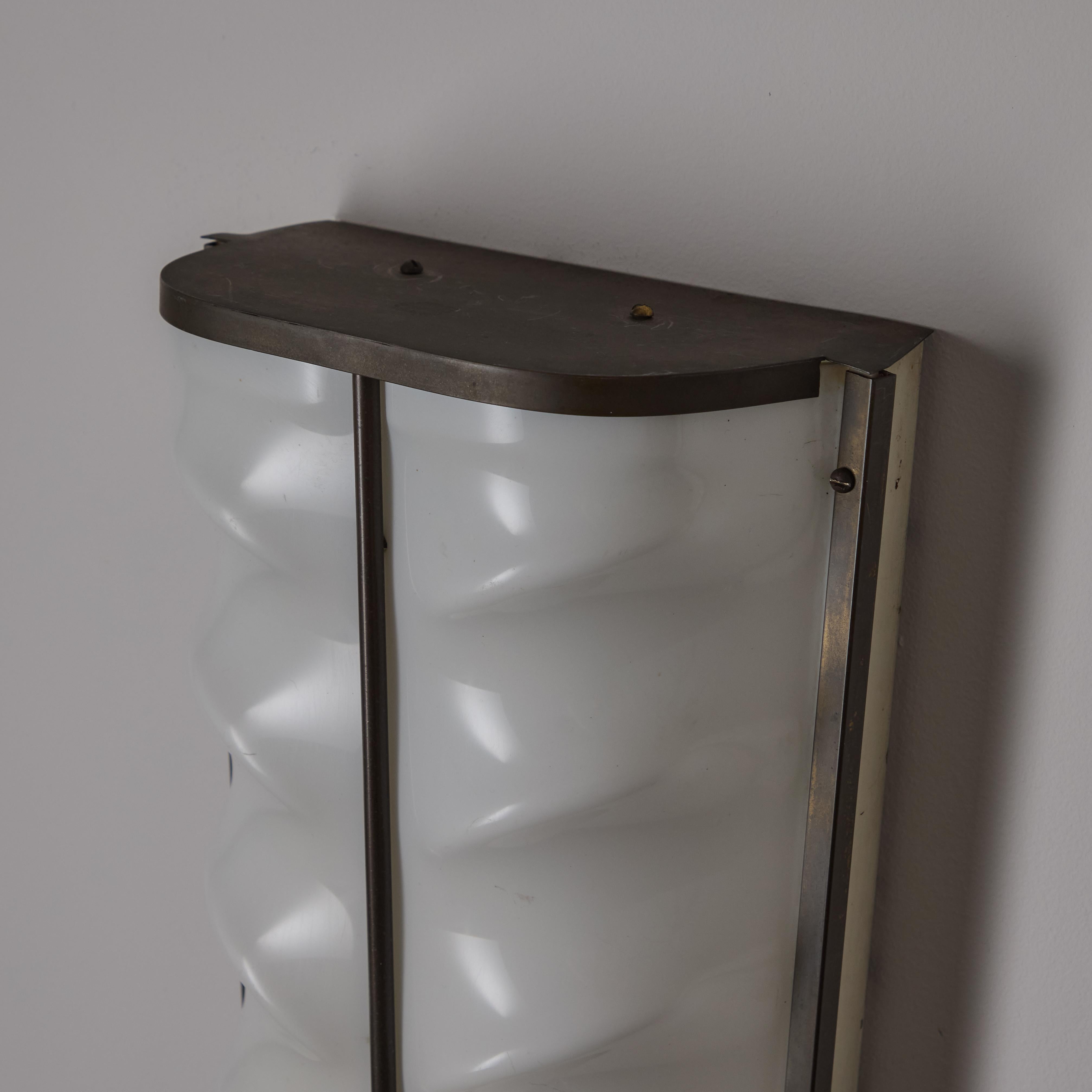 A Pair of Sconces by Stilux 2