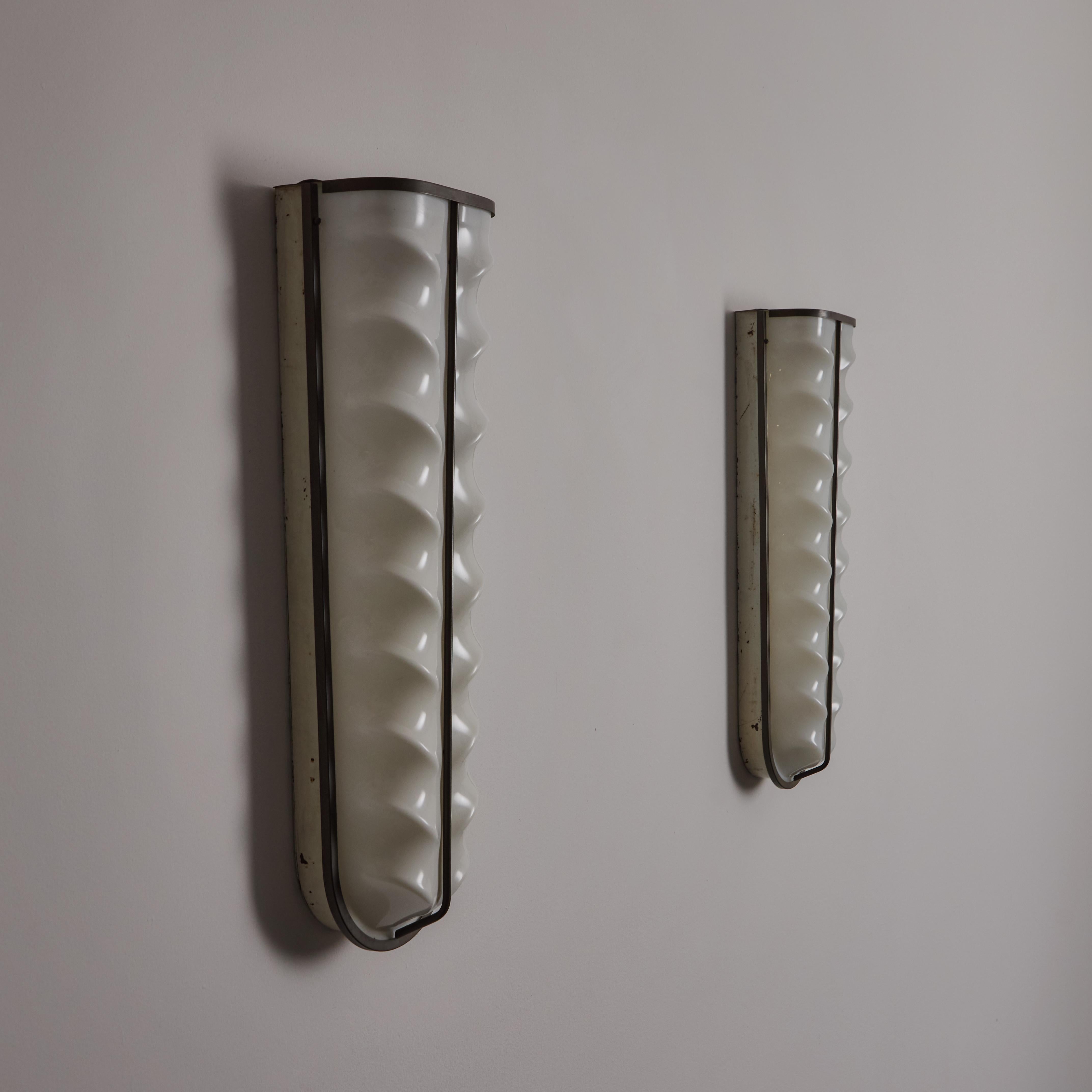 A Pair of Sconces by Stilux 5
