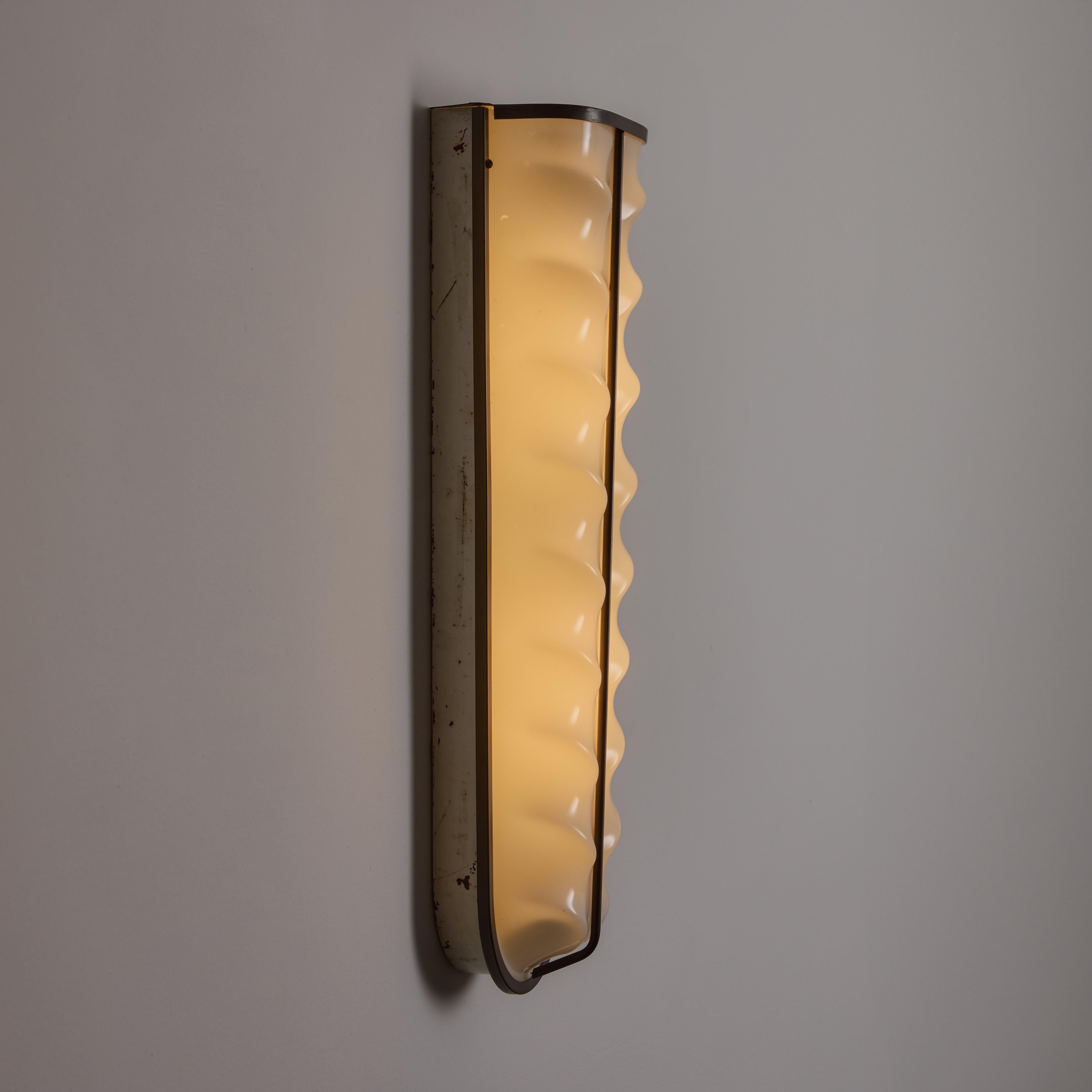 A Pair of Sconces by Stilux 7