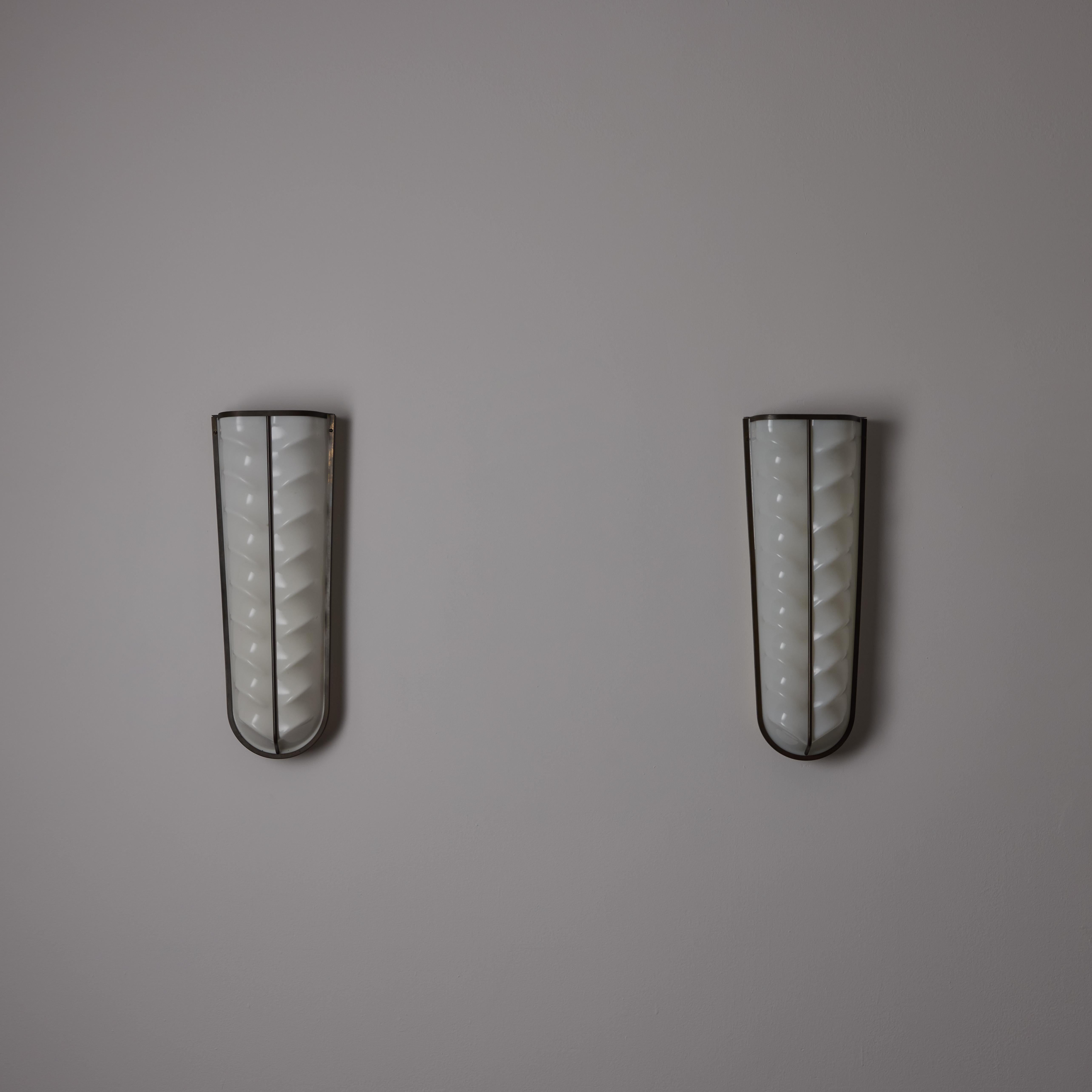 Mid-Century Modern A Pair of Sconces by Stilux
