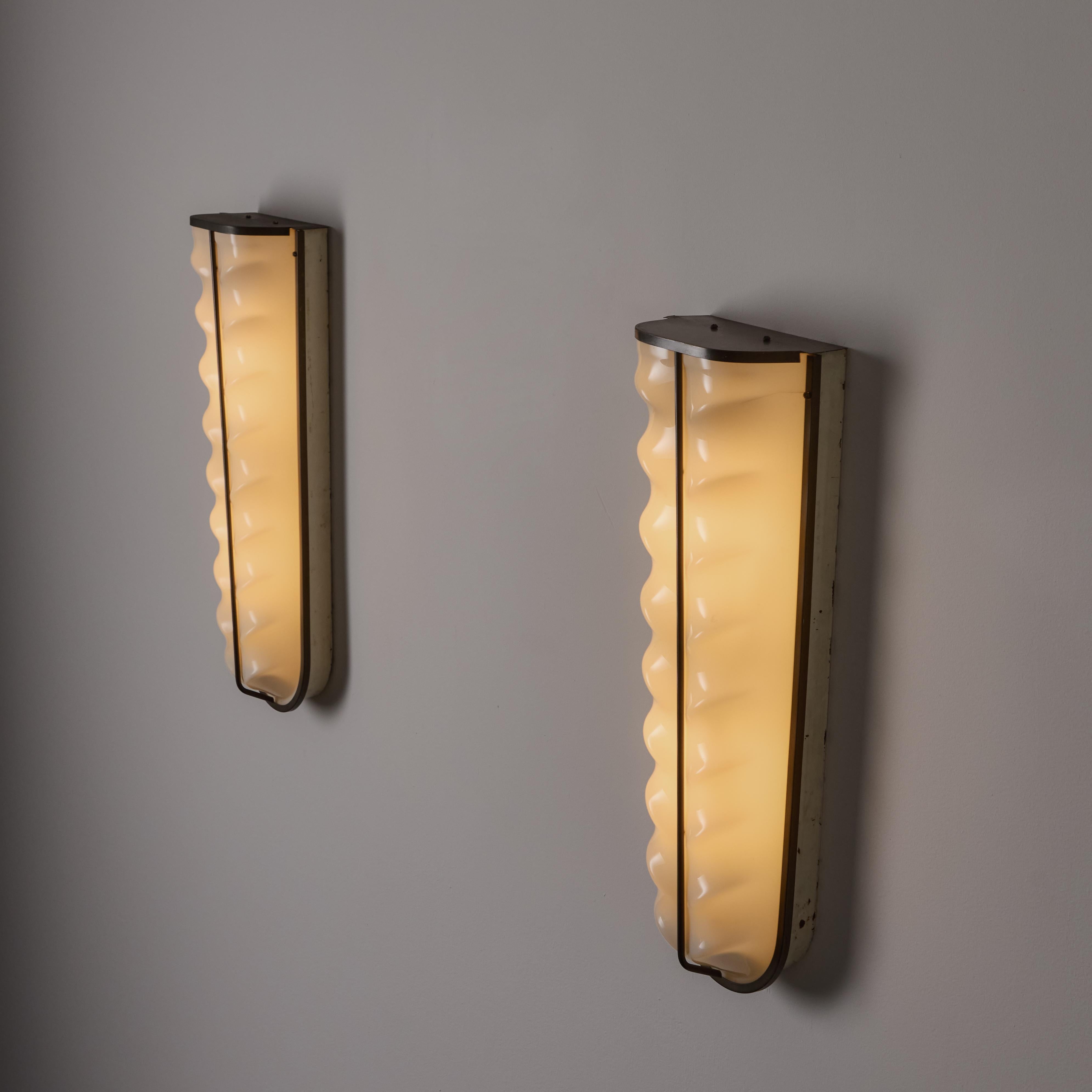 20th Century A Pair of Sconces by Stilux