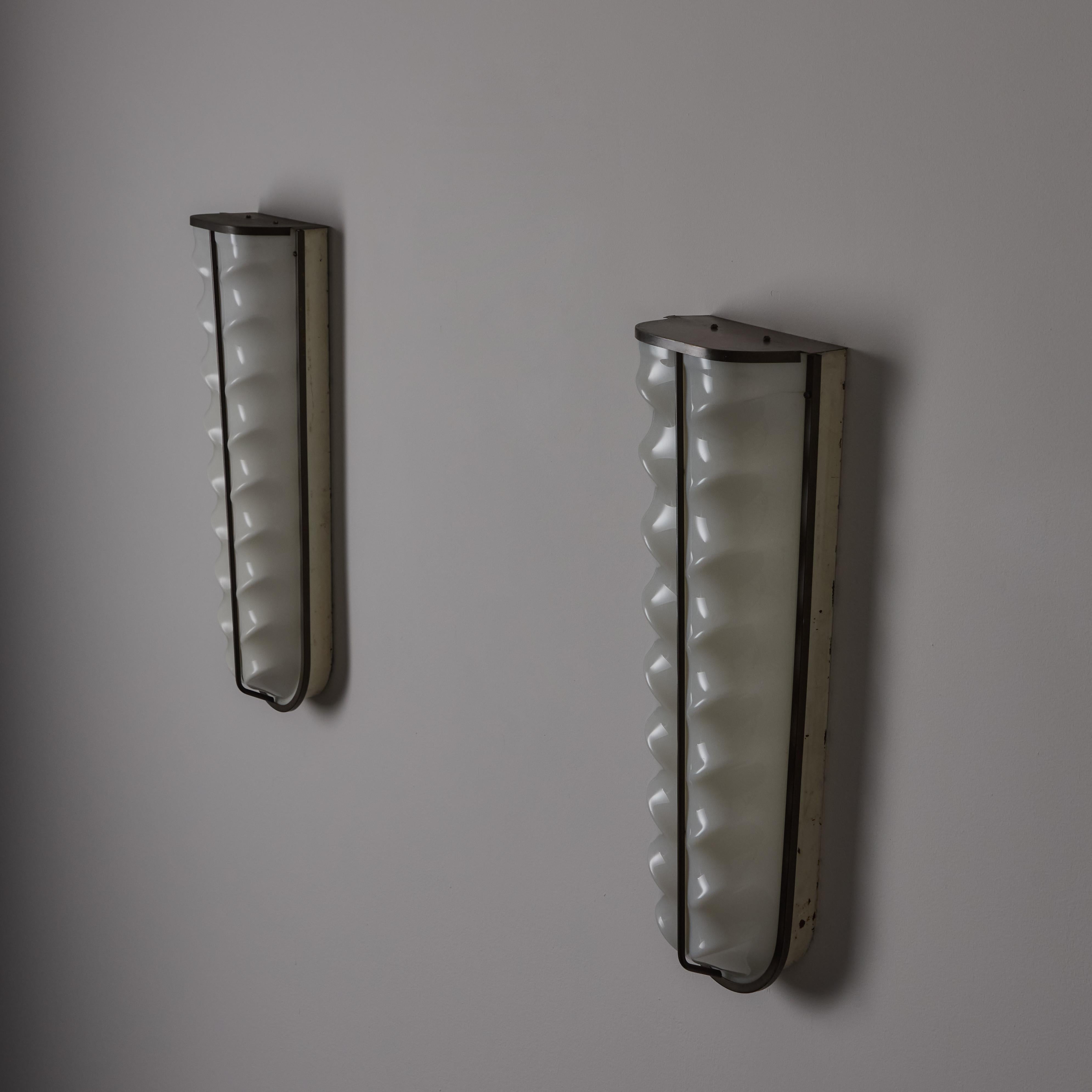 Brass A Pair of Sconces by Stilux