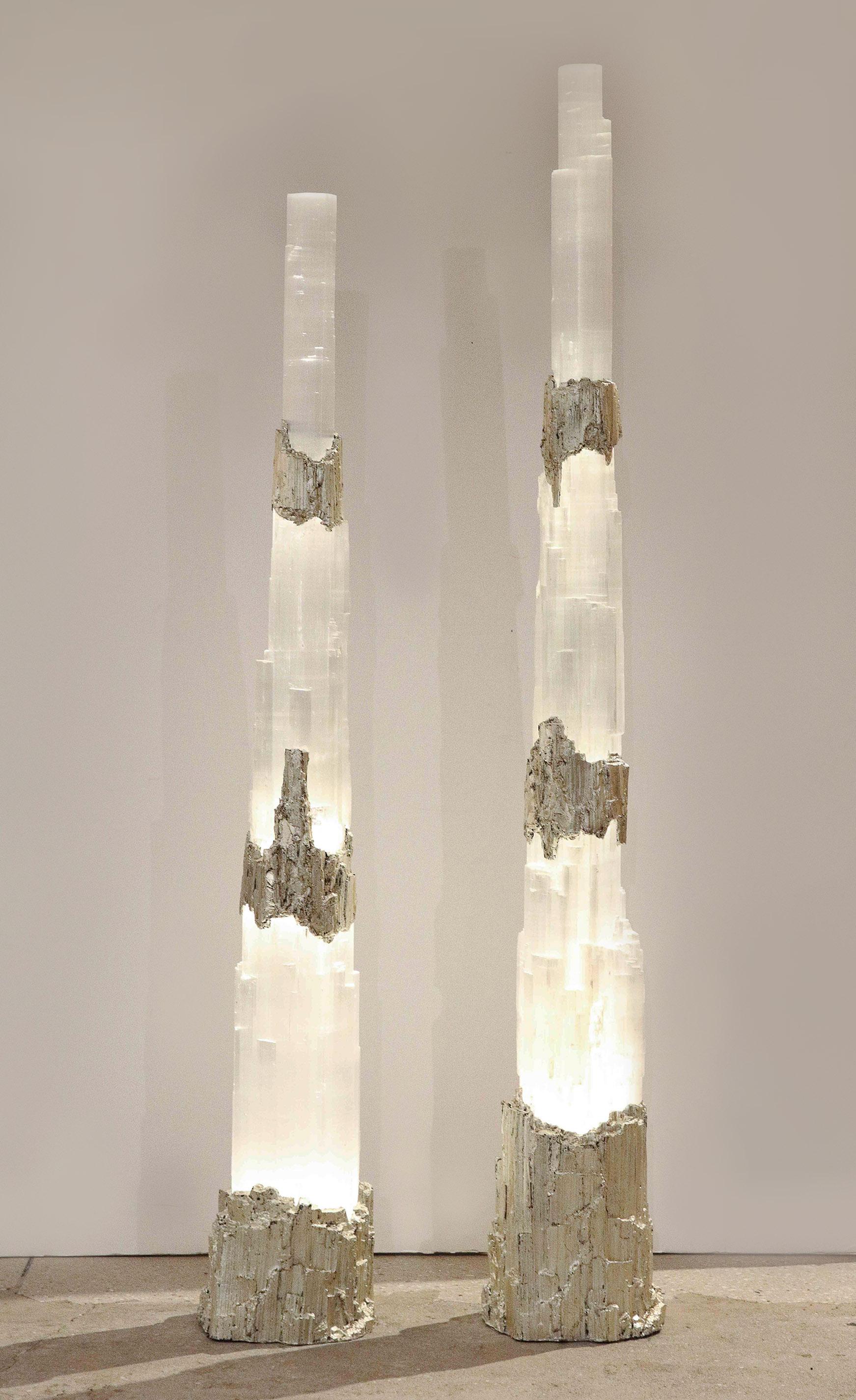 A pair of unique hand sculpted Selenite and White Gold gilt totems. Each with a dimmable internal light. 

Can be sold individually.

Smaller: 47.25