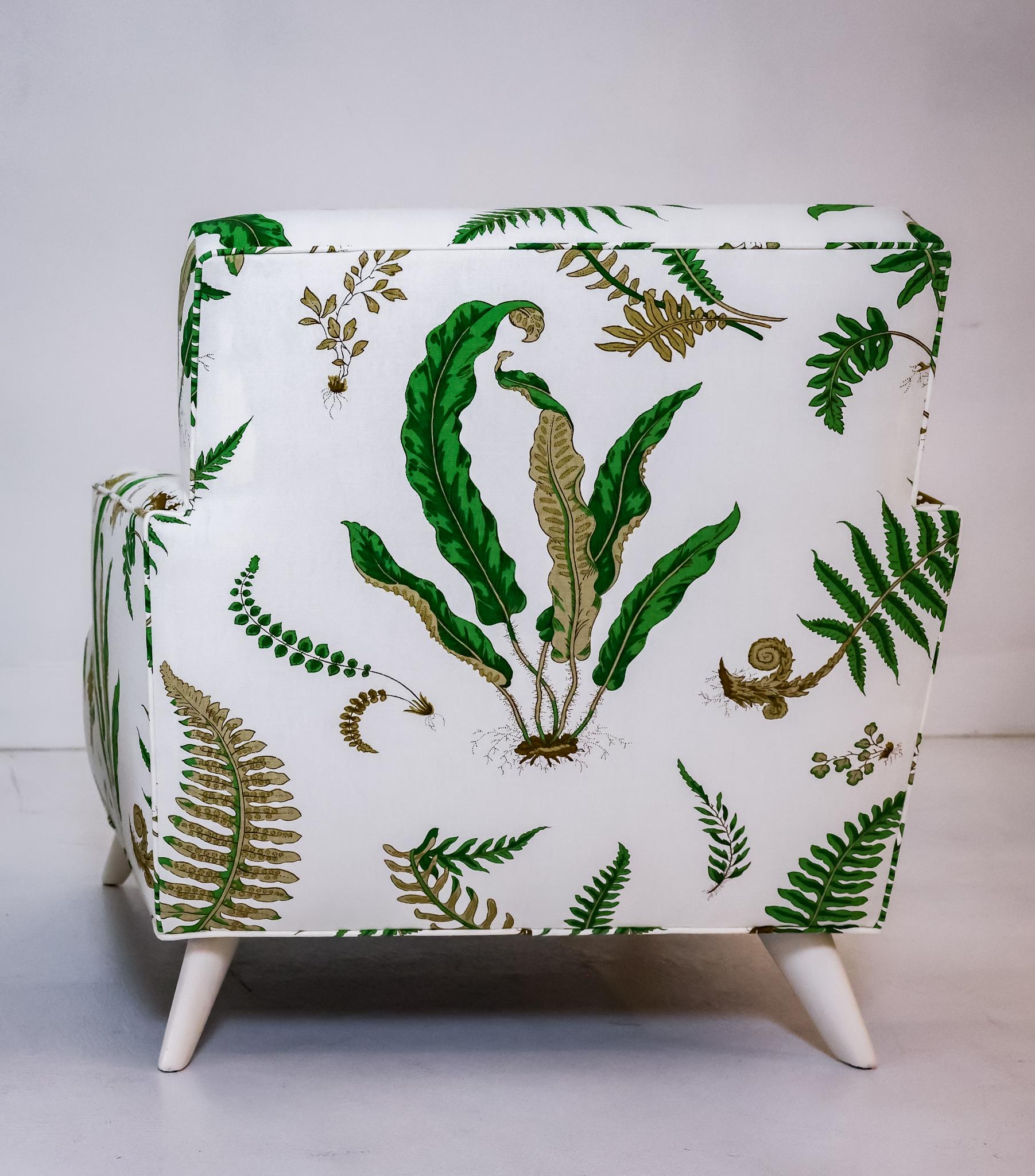 This is a pair of Billy Haines' most popular designs, the Seniah Chair # 13. The chairs have been fully restored and reupholstered in the original fern print (currently still in production), a Haines favorite. The legs are walnut and have been