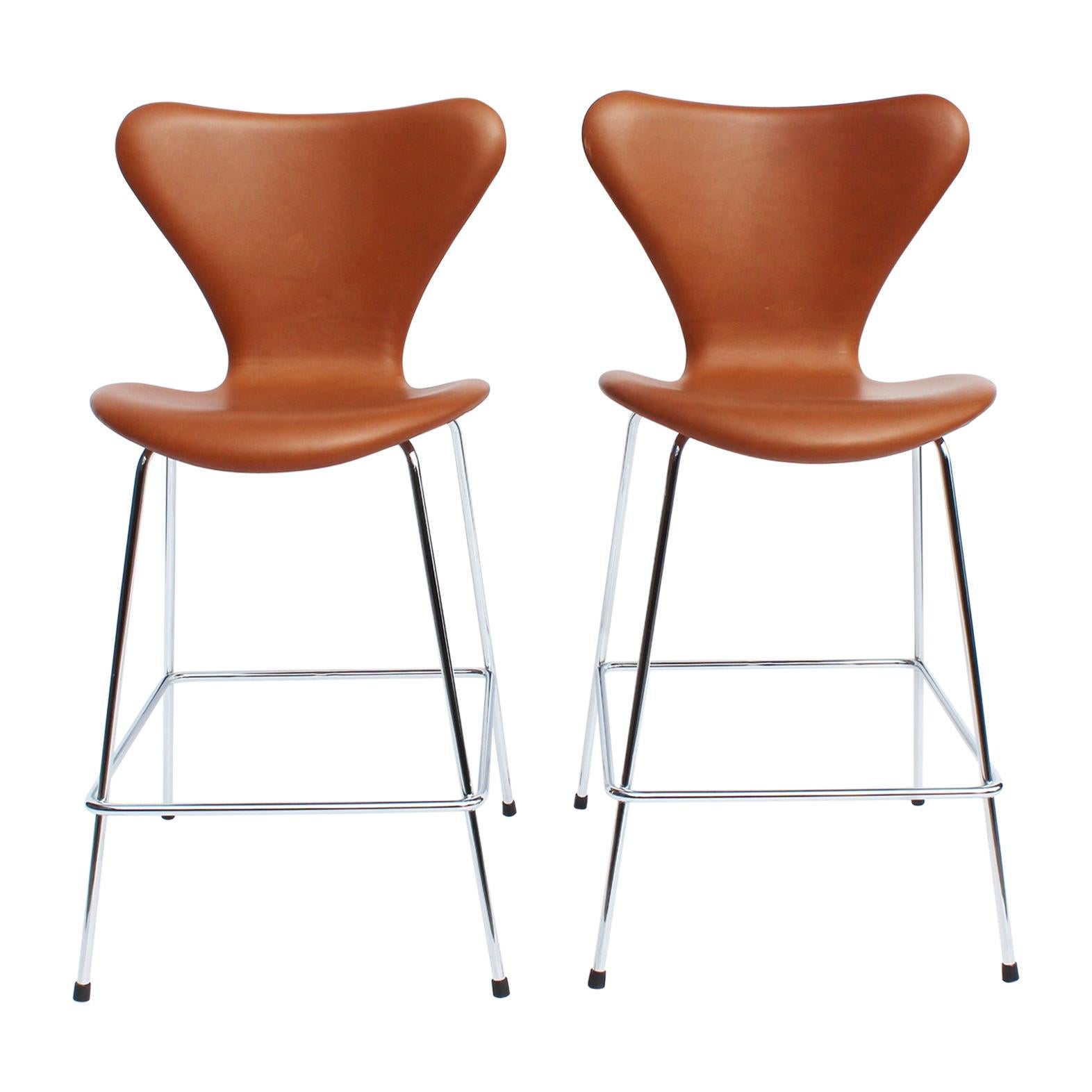 Pair of Seven Bar Stools, Model 3187, with Cognac Leather by Arne Jacobsen