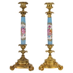 A Pair of Sèvres Porcelain and Gilt Bronze Candlesticks, 19th Century.