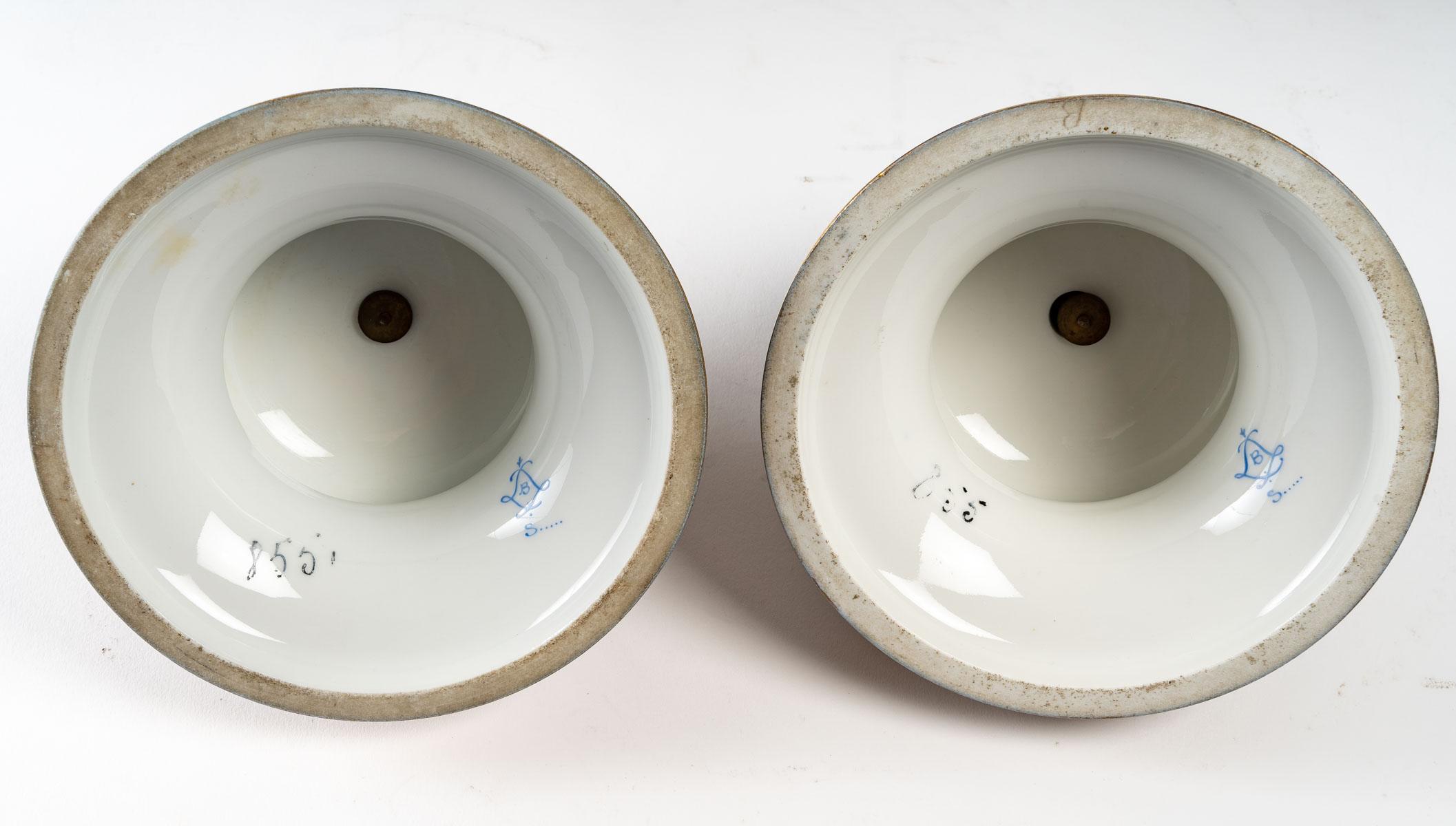A pair of Sèvres porcelain covered vases, signed J. Lascot, late 19th century, Napoleon III period.
Measures: H: 53 cm, D: 18 cm.