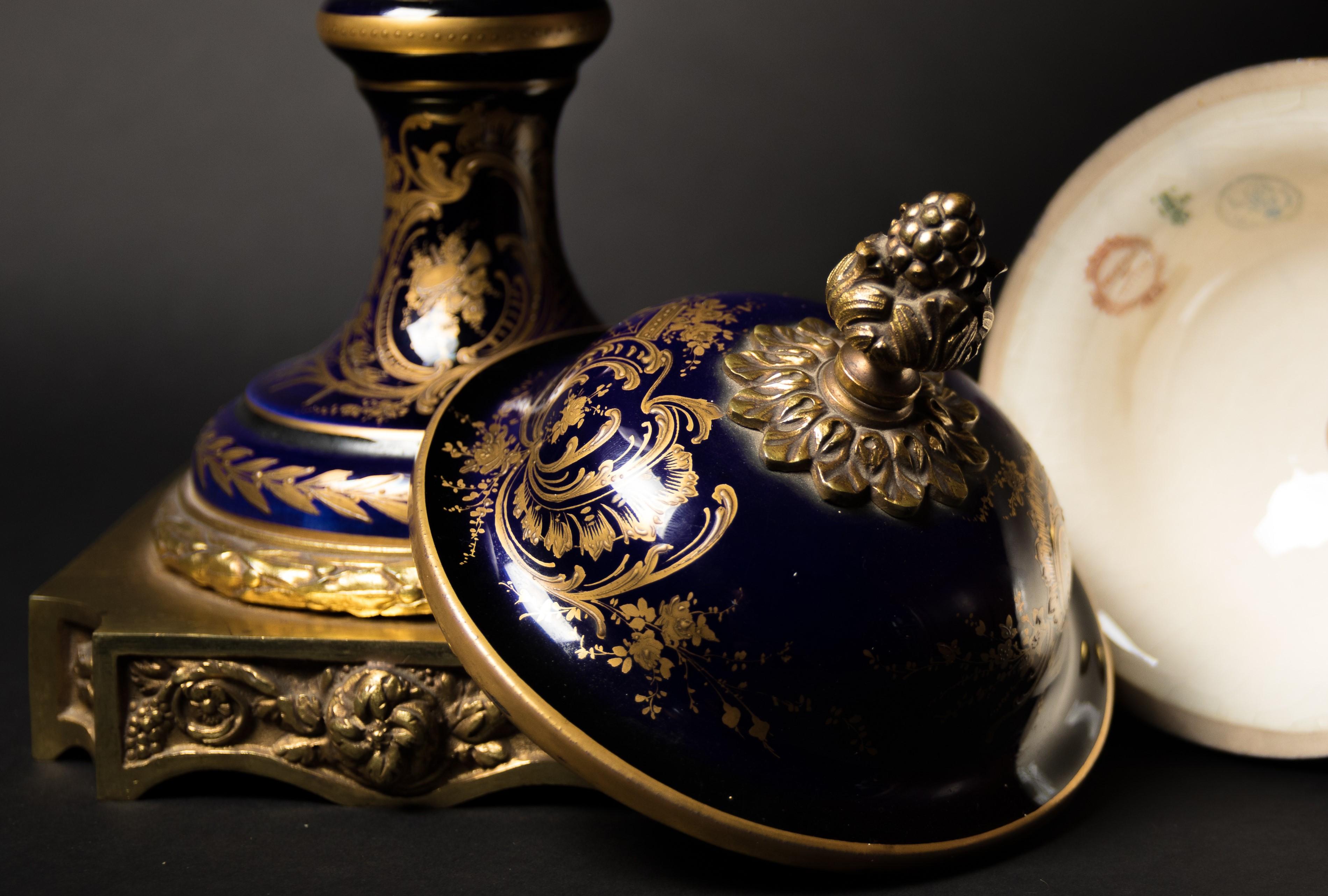 A pair of Sèvres Porcelain vases, circa 1880. The vases are finely painted and decorated with bronze gilded.