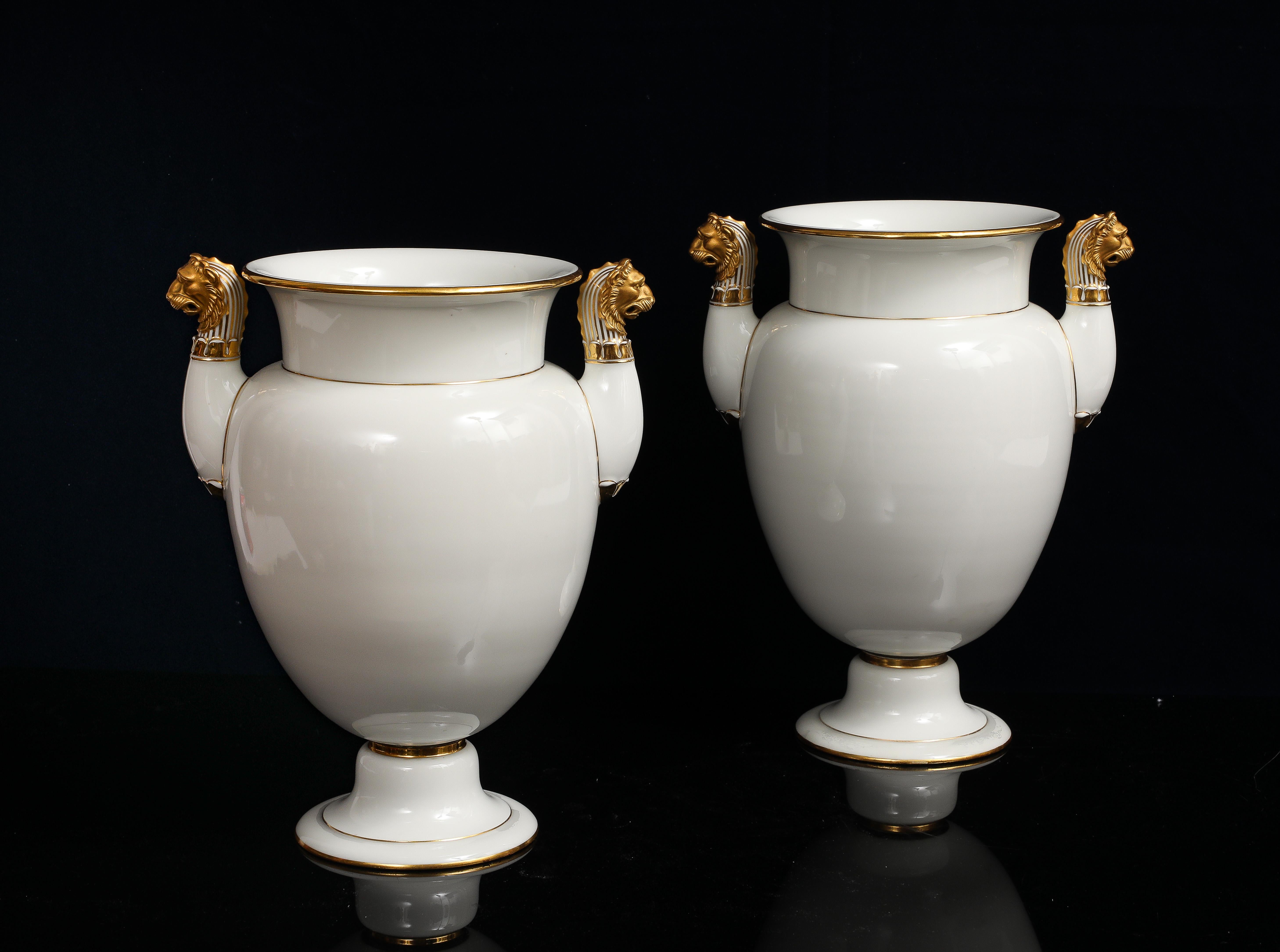 A Pair of Sevres Porcelain White Ground & 24K Gold vases w Lion Head Handles in vendita 1