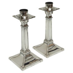 A Pair of Silver Candlesticks by William Hutton & Sons