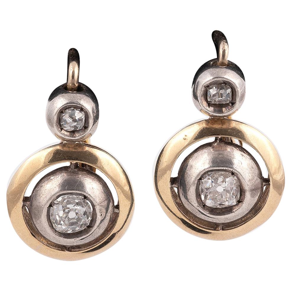 Pair of Silver Gold and Diamond Earrings For Sale