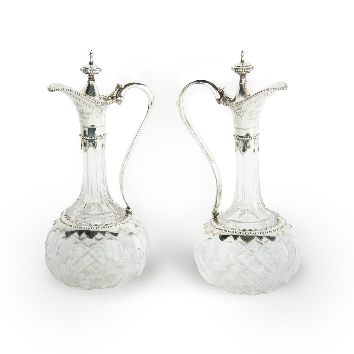 A pair of silver-mounted crystal Royal presentation claret jugs For Sale 4