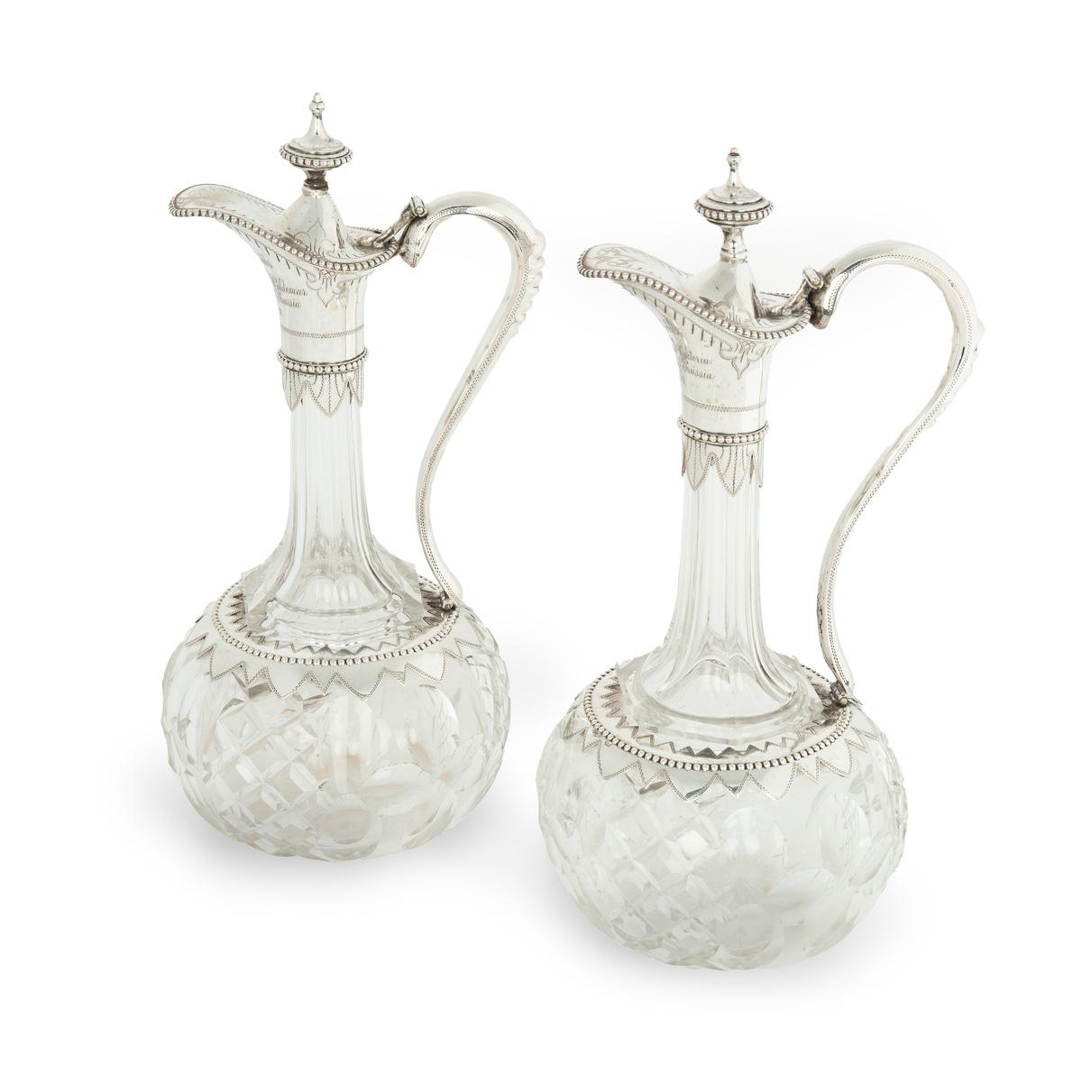 19th Century A pair of silver-mounted crystal Royal presentation claret jugs For Sale