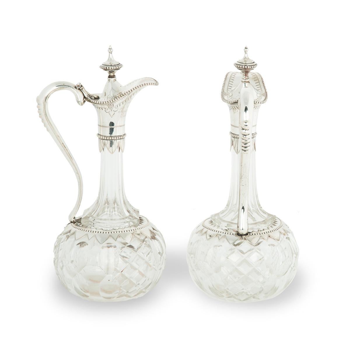 A pair of silver-mounted crystal Royal presentation claret jugs For Sale 2