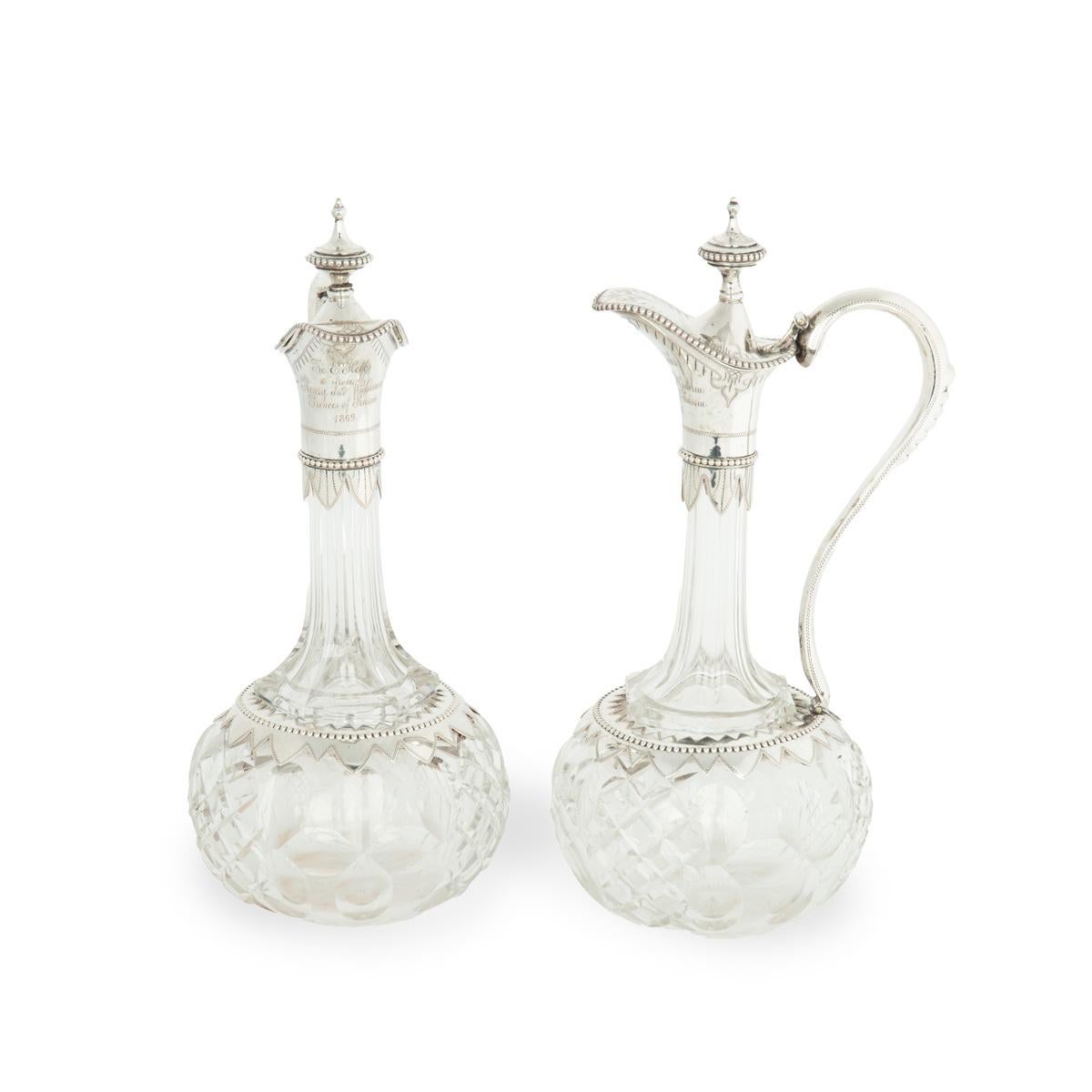 A pair of silver-mounted crystal Royal presentation claret jugs For Sale 3