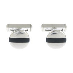 Pair of Silver Onyx Cufflinks by Cartier