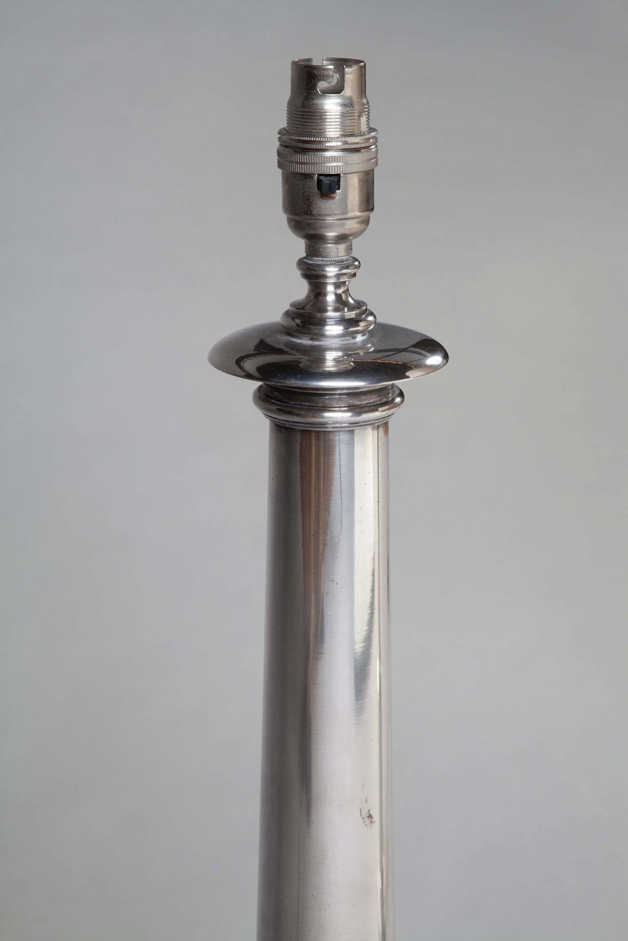 pair of silver lamps