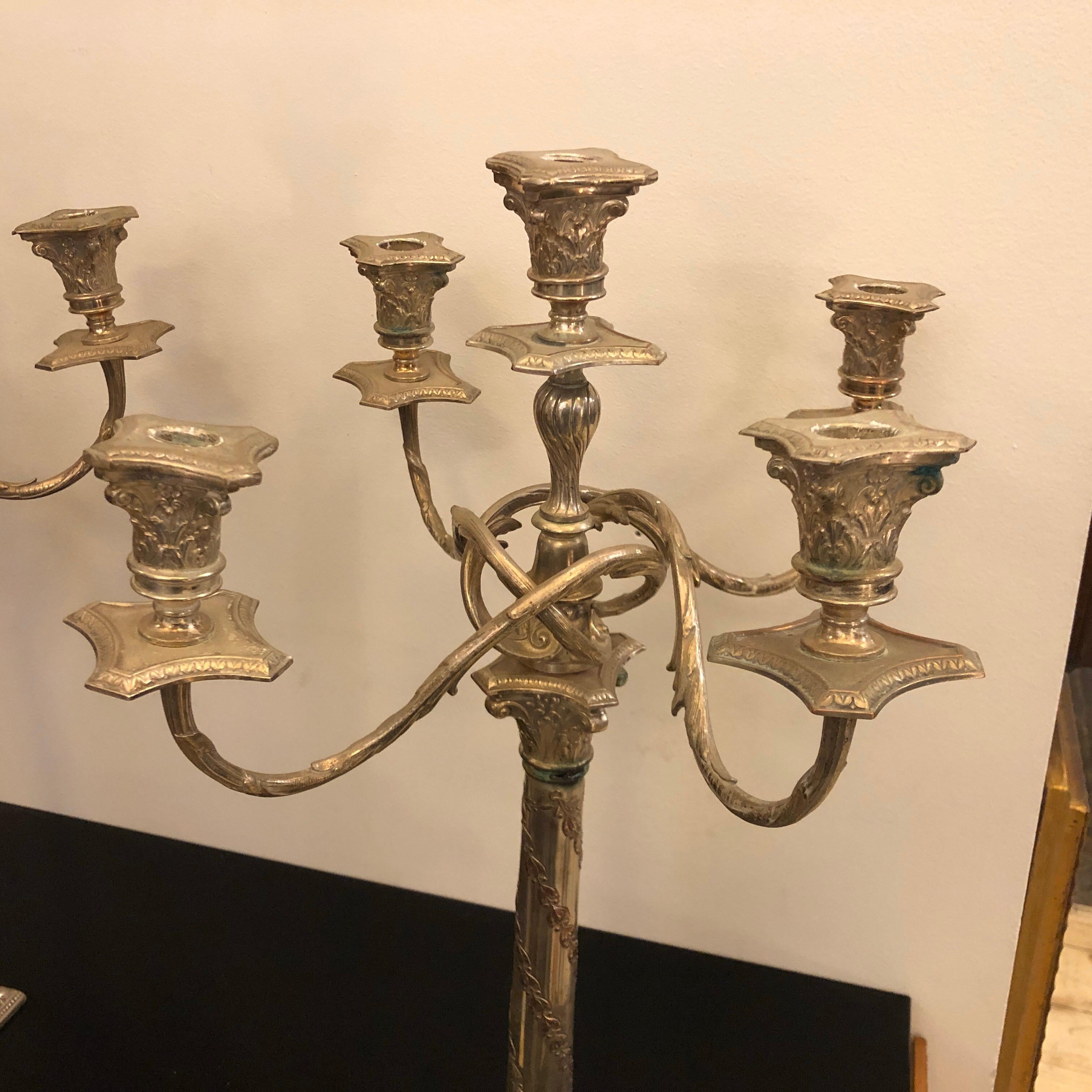 Two candelabras made in Germany by W.M.F, they are in the Art Nouveau catalogue of the factory. They can be used also like two single candlesticks.