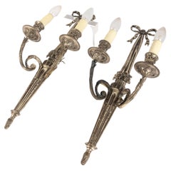 A pair of silver plated Louis XVI sconces