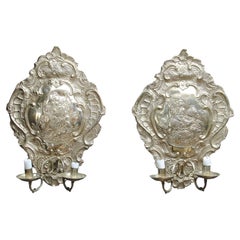 A Pair Of Silvered Wall Sconces