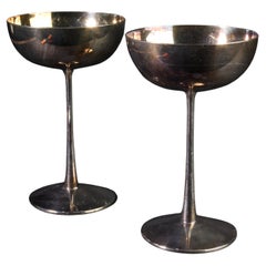  A pair of silverplate coupe classes of goblets was made by F.B Rogers Silver in