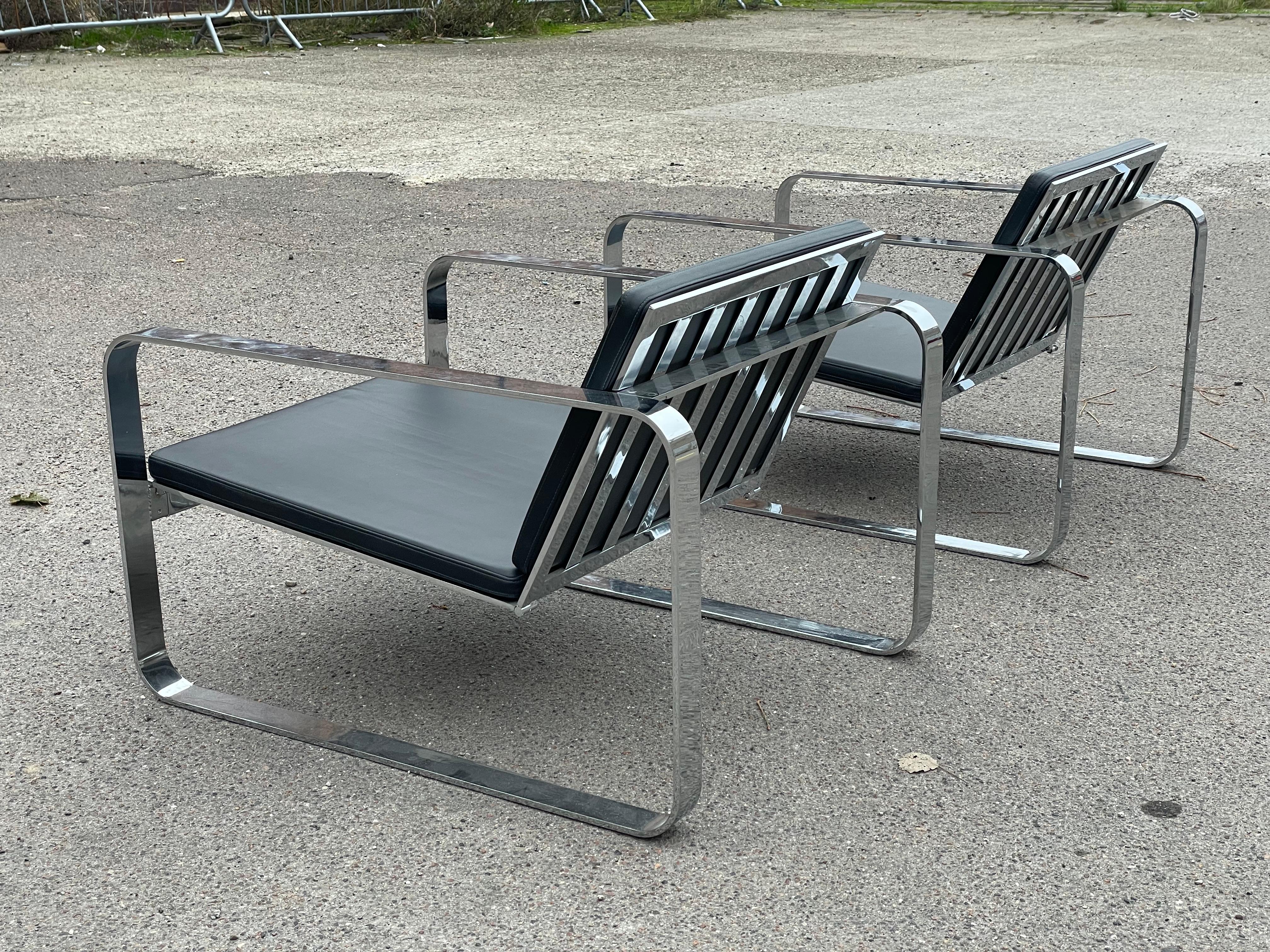 A pair of Silverstone Chairs designed by Danish designer Morten Voss in 1999 4