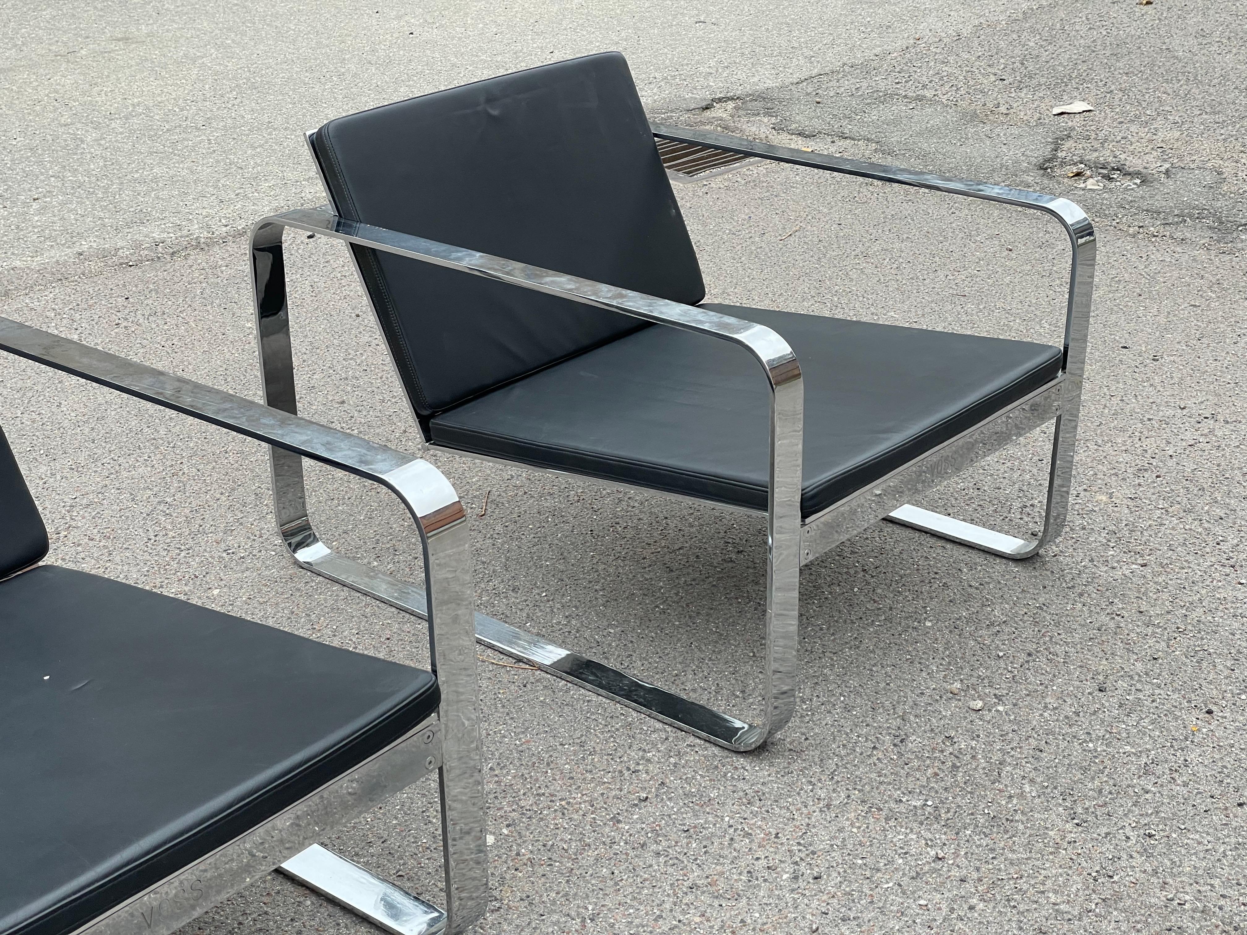 A pair of Silverstone Chairs designed by Danish designer Morten Voss in 1999 5