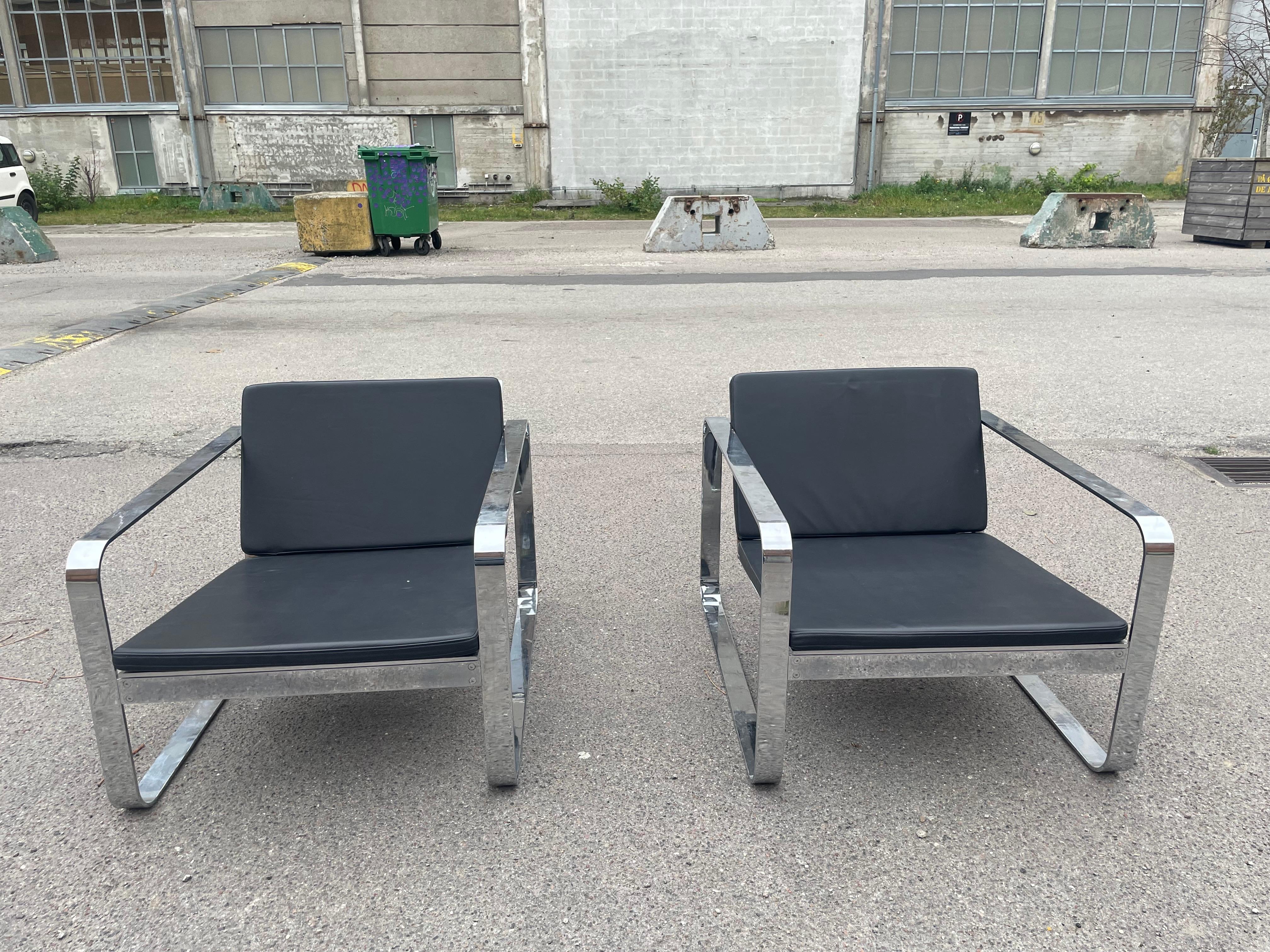 A pair of Silverstone Chairs designed by Danish designer Morten Voss in 1999 7