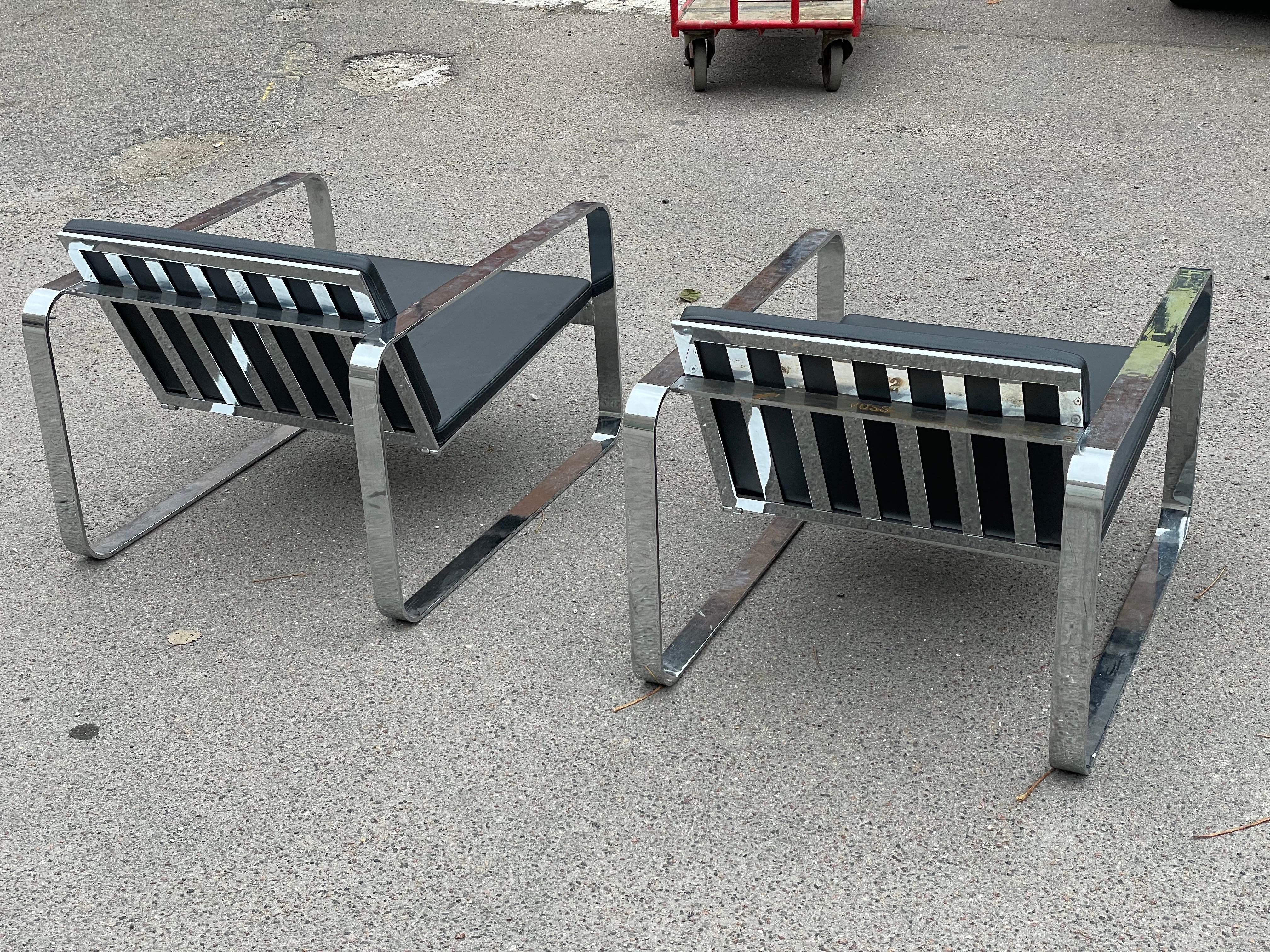 A pair of Silverstone Chairs designed by Danish designer Morten Voss in 1999 9
