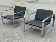 A pair of Silverstone Chairs designed by Danish designer Morten Voss in 1999