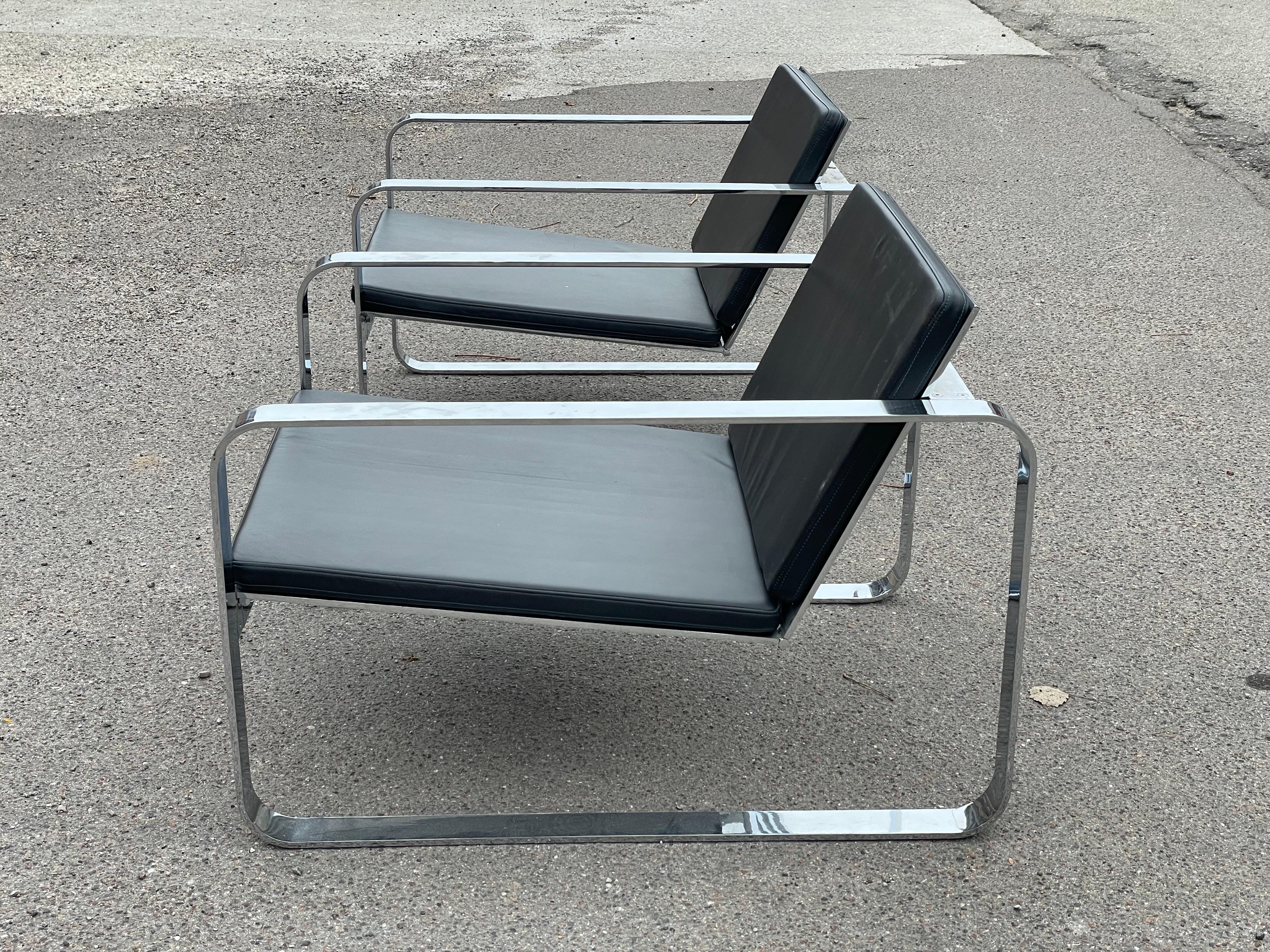 A pair of Silverstone Chairs designed by Danish designer Morten Voss in 1999 2