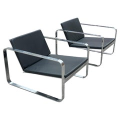 A pair of Silverstone Chairs designed by Danish designer Morten Voss in 1999