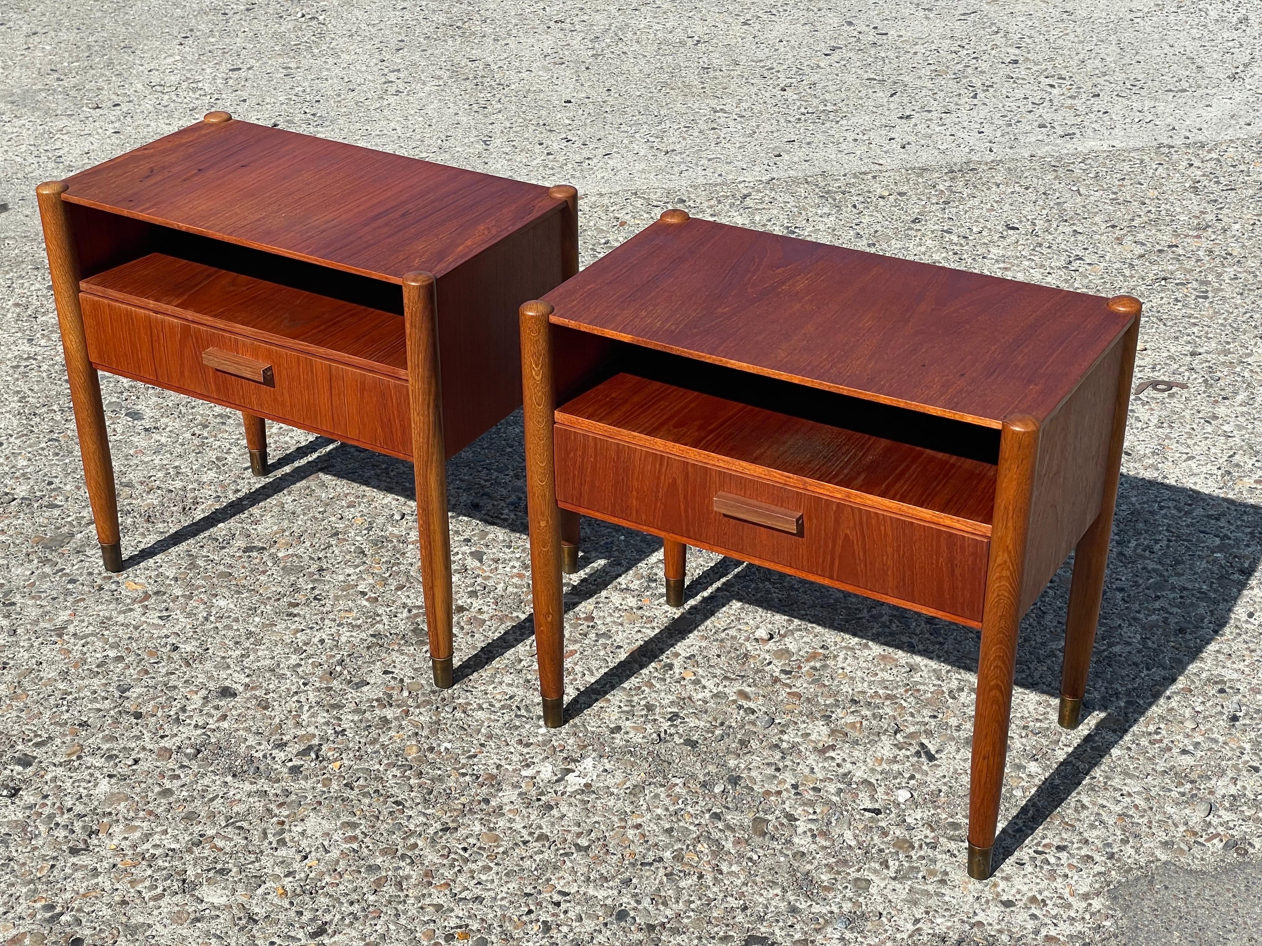 A pair of unique nightstands made from teak and oak. Tradional danish mid century modern craftmanship from the 1960´s. Simple but stunning details exposing the minimalism and functionality of this glorious era of Danish design.