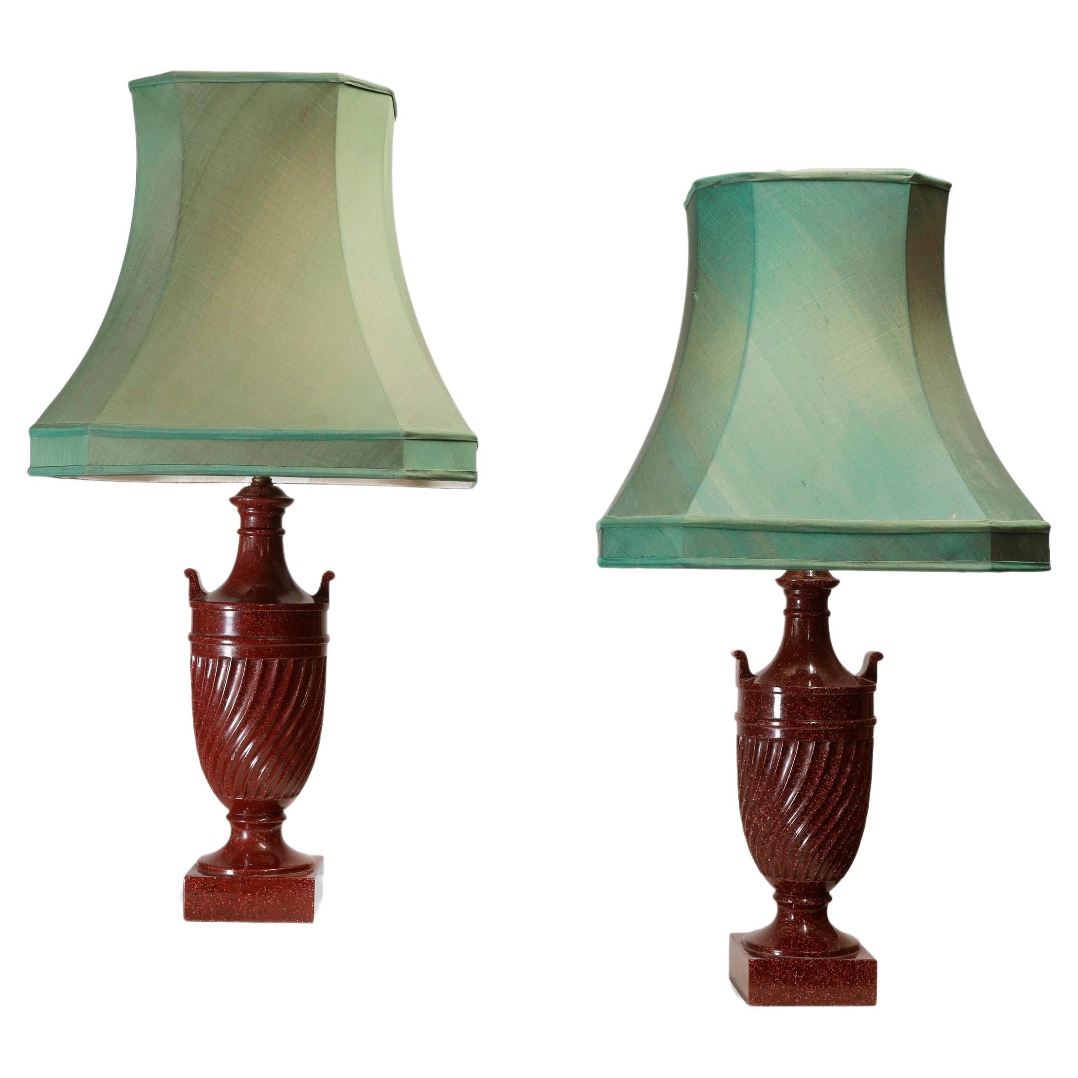A pair of simulated porphyry table lamps in the shape of urns For Sale
